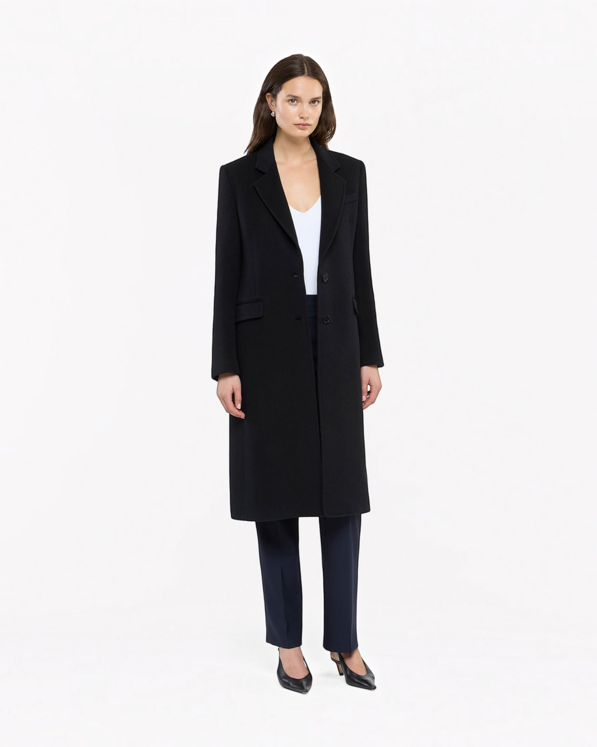 Weldun black cashmere tailored overcoat worn by a model with a white top and dark trousers