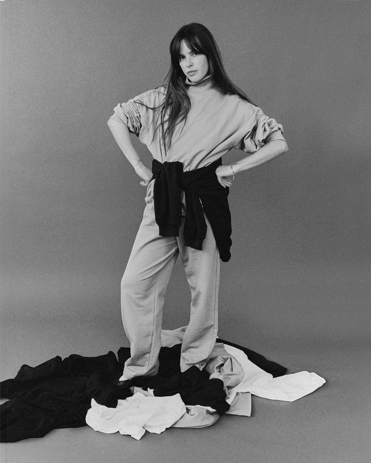 Weldun model wearing grey organic cotton sweatpants with a relaxed straight-leg fit and a plush fleece interior.