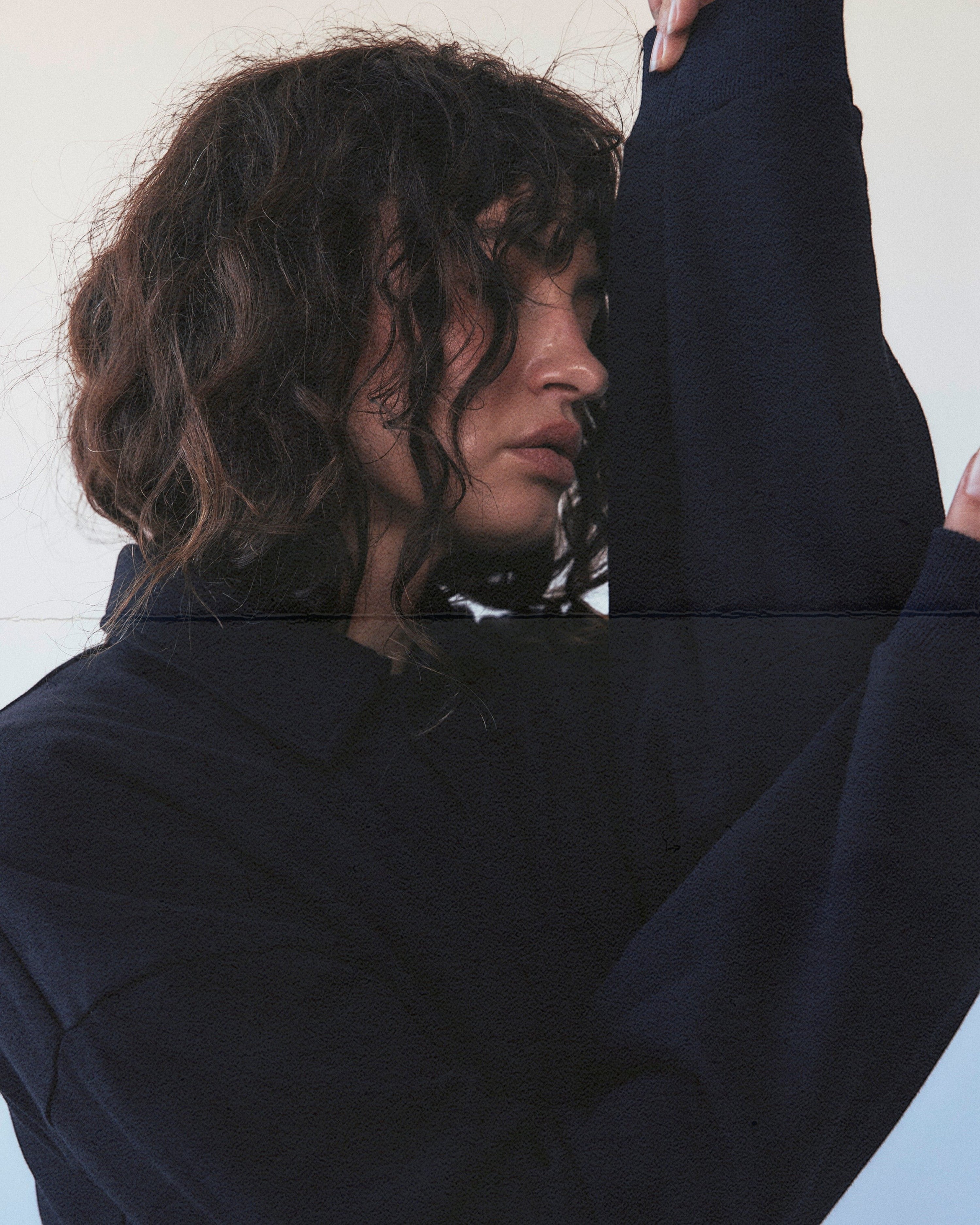 Weldun navy cotton polo sweatshirt with a high-neck ribbed collar and oversized fit worn by a woman