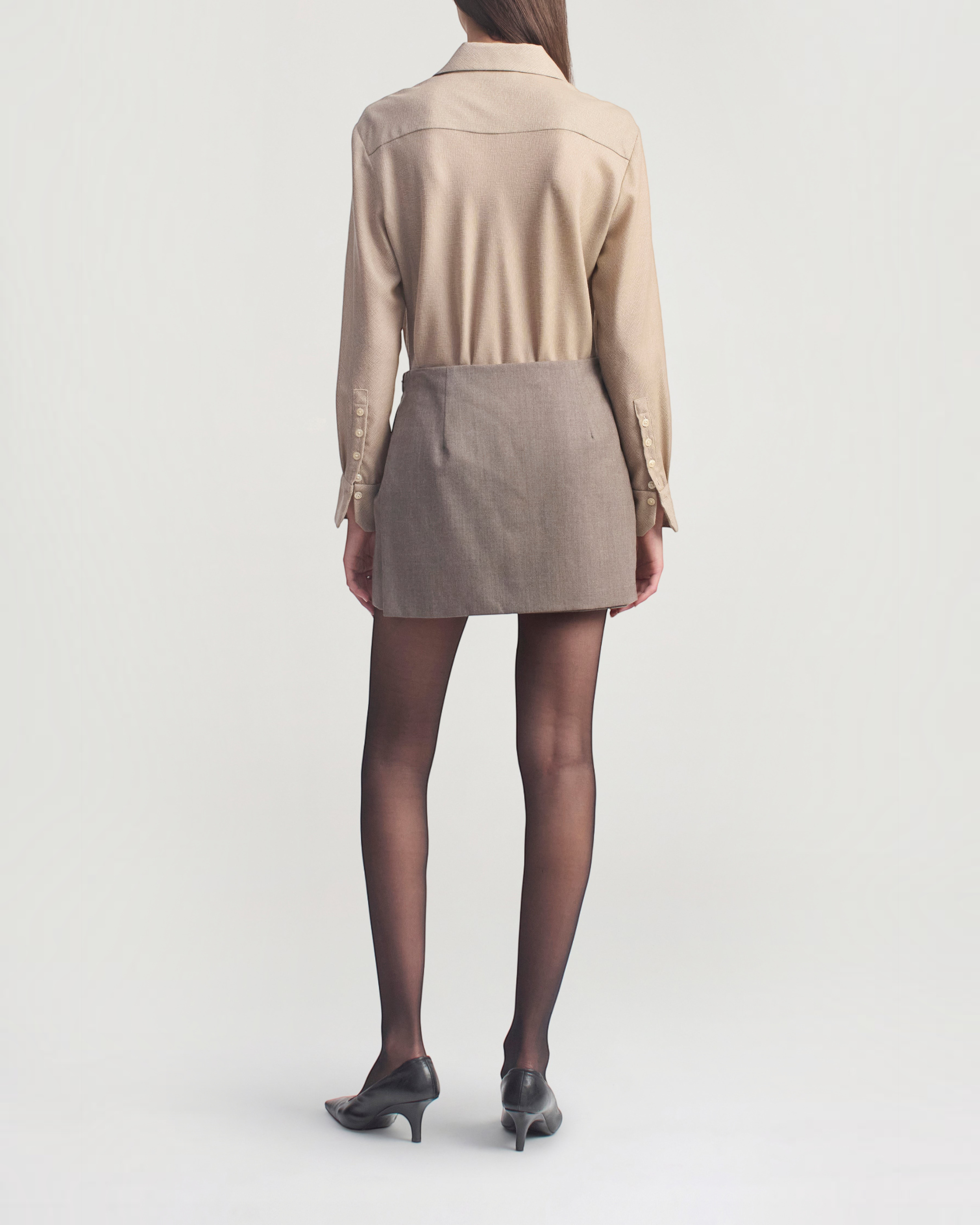 Weldun KALLMEYER Joan Bias Button Down in taupe featherweight wool worn with a mini skirt, back view