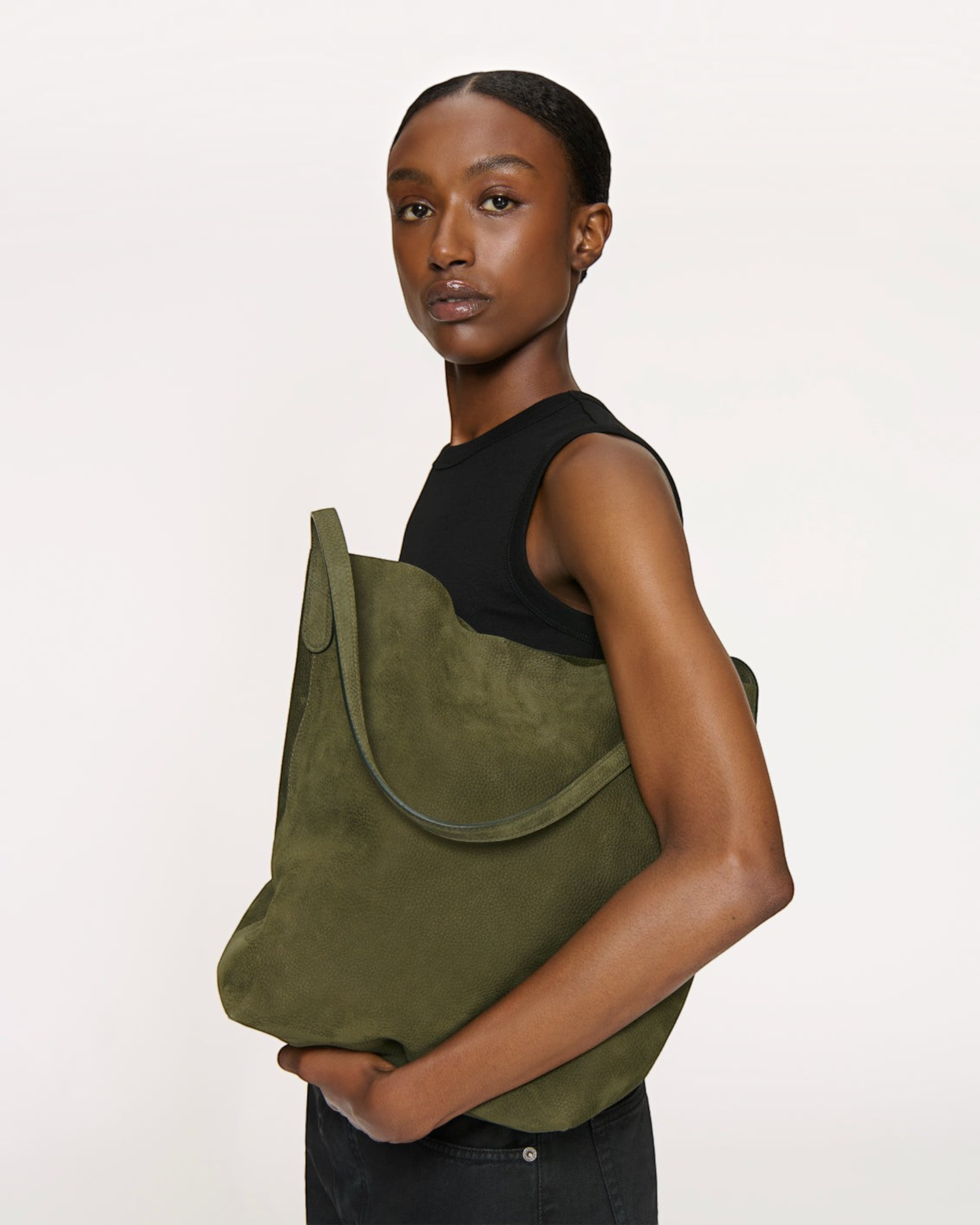 Weldun Mansur Gavriel Everyday Cabas in algae green pebbled nubuck leather with a slouchy, unstructured design.