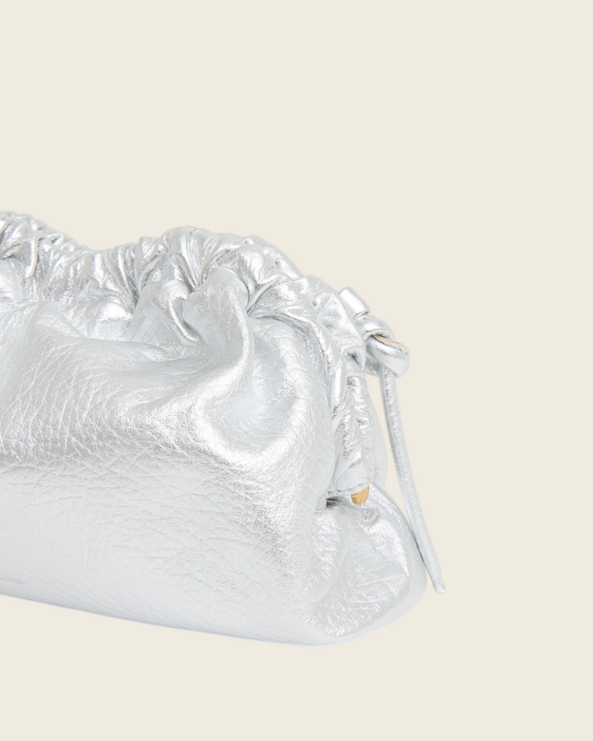 Weldun Mansur Gavriel Mini Cloud Clutch in tumbled silver Italian lambskin leather with a soft, sculptural frame.