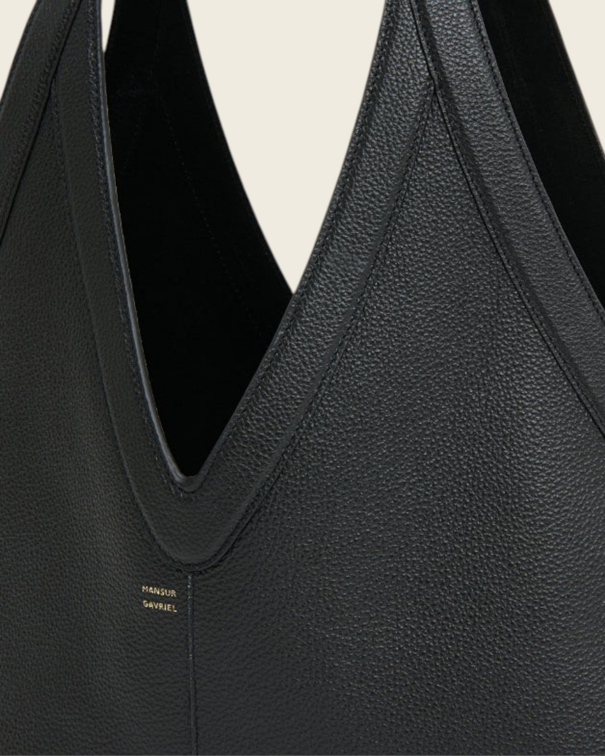 Weldun Mansur Gavriel Soft M Tote in black pebbled leather with a V-shaped neckline and gold logo detail