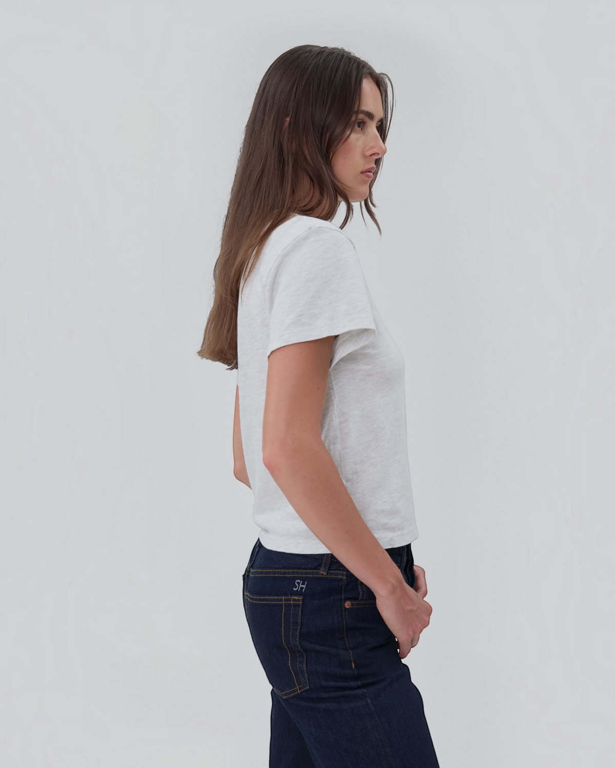 Weldun Still Here grey short sleeve cotton Henley shirt with a relaxed fit worn by a model in profile view