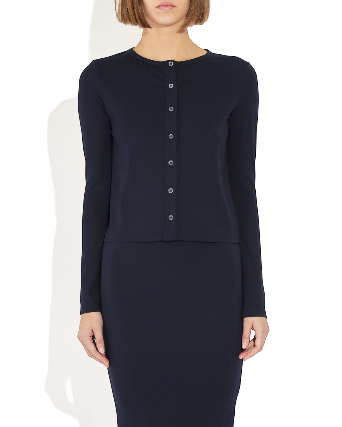 Weldun Arely Cardigan in navy blue MicroTencel with a button-front design and long sleeves on a model