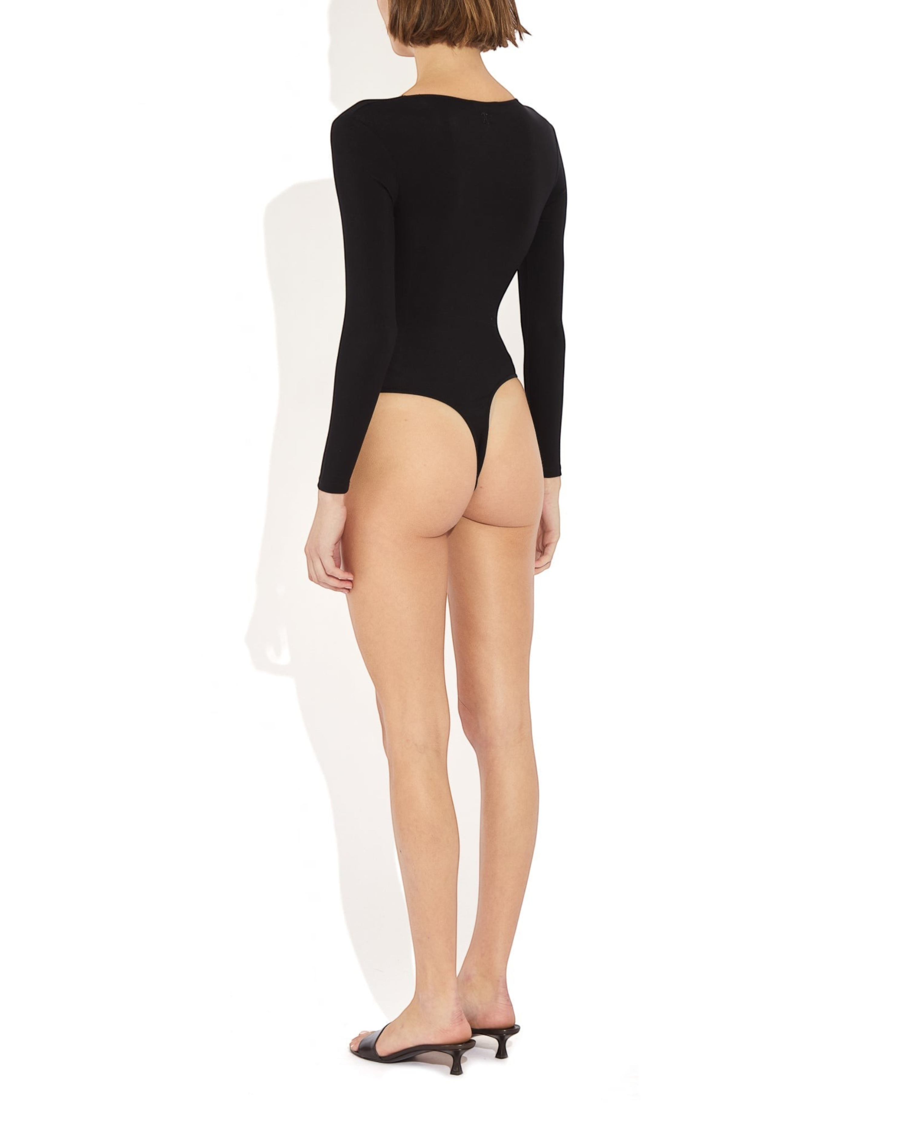 Weldun Donna long-sleeve black bodysuit in soft stretch-knit fabric with a cheeky cut, shown from the back view.