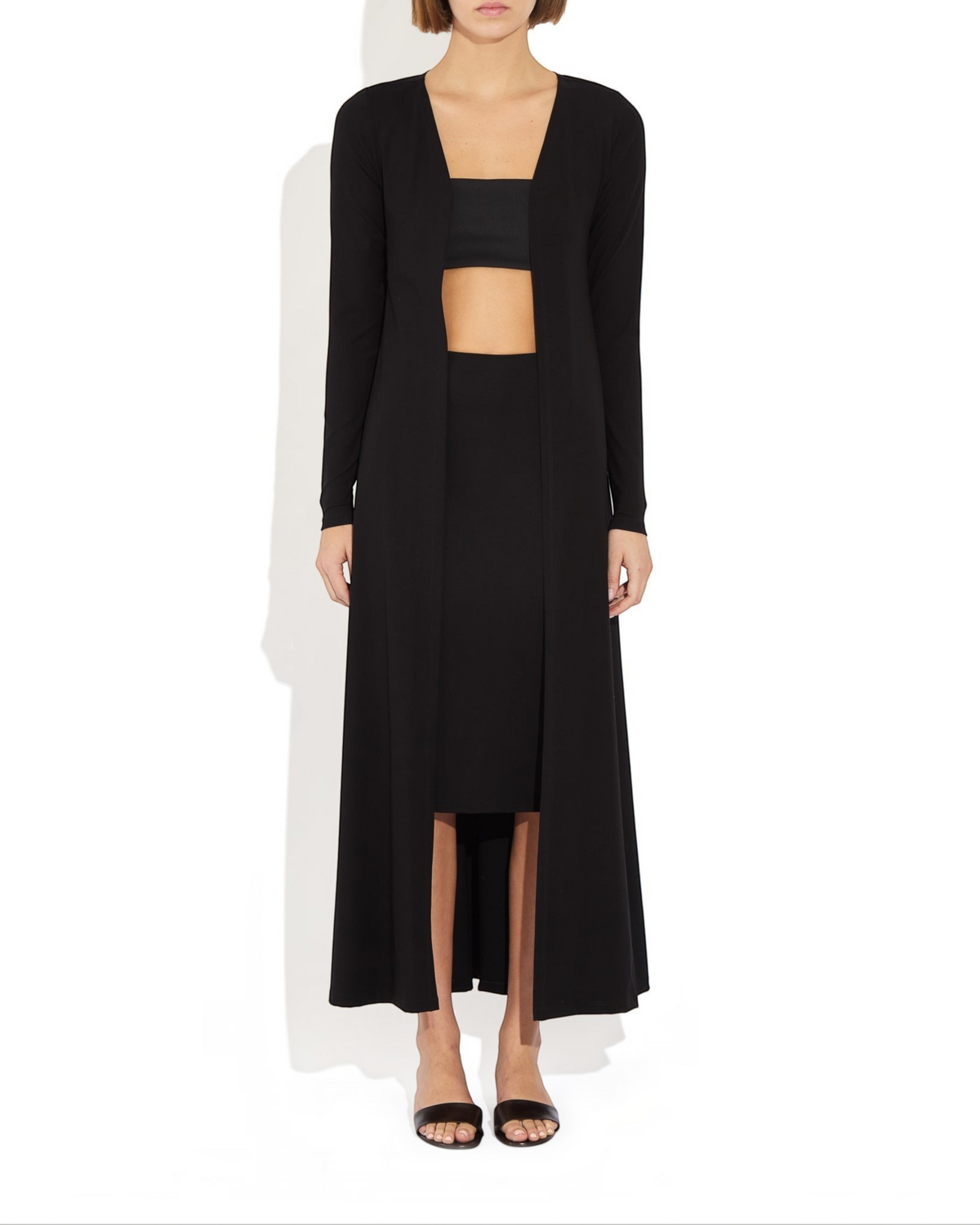 Weldun Julia long black open-front cardigan made from soft breathable PYRATEX fabric worn by a model