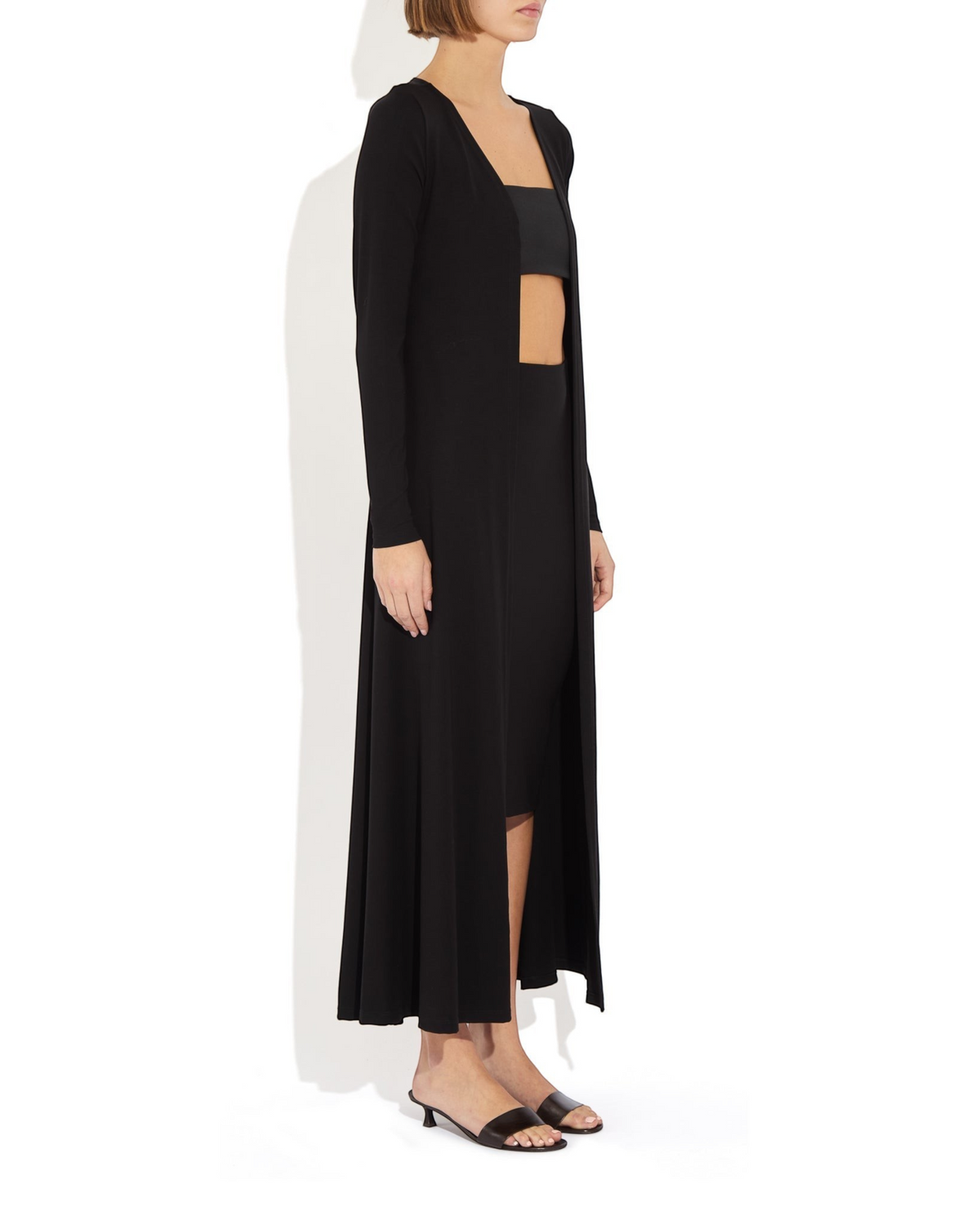 Weldun Julia Cardigan in black, a long open-front fluid layer made from soft, breathable PYRATEX Power 3 fabric.
