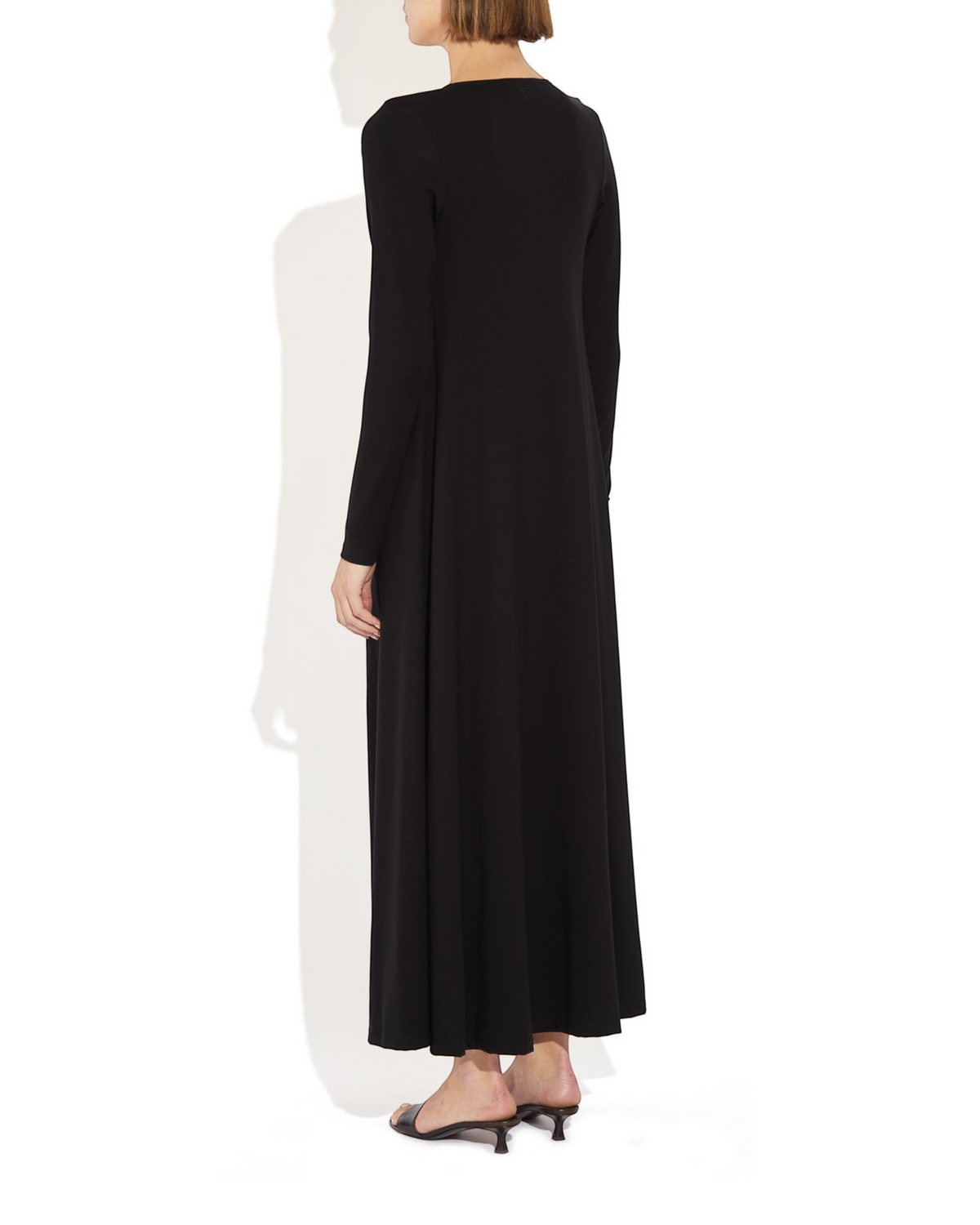 Weldun Julia long black fluid cardigan in soft stretch PYRATEX fabric, back view on a model