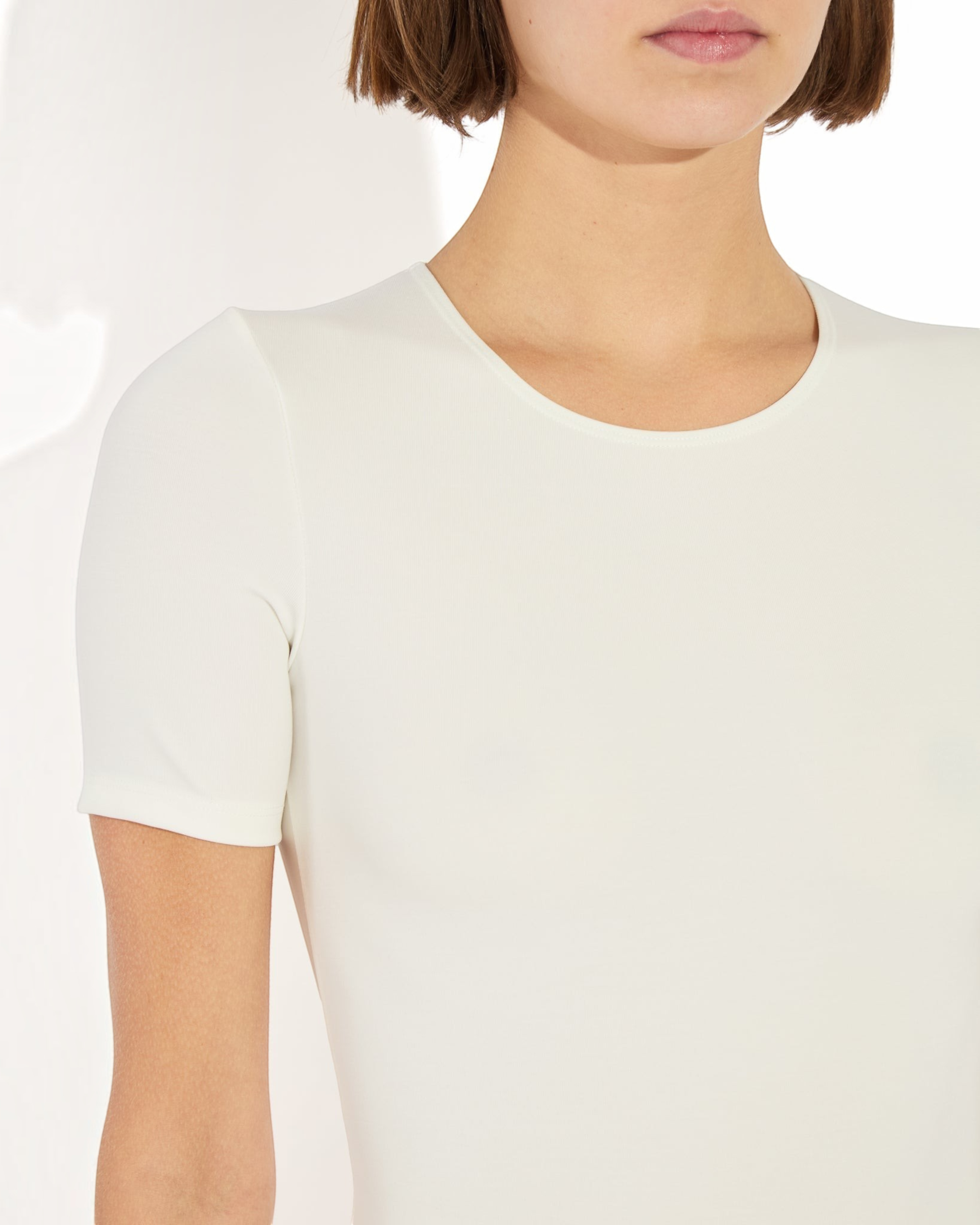 Weldun Penny short-sleeve bodysuit in white MicroTencel fabric featuring a flattering ballerina neckline.