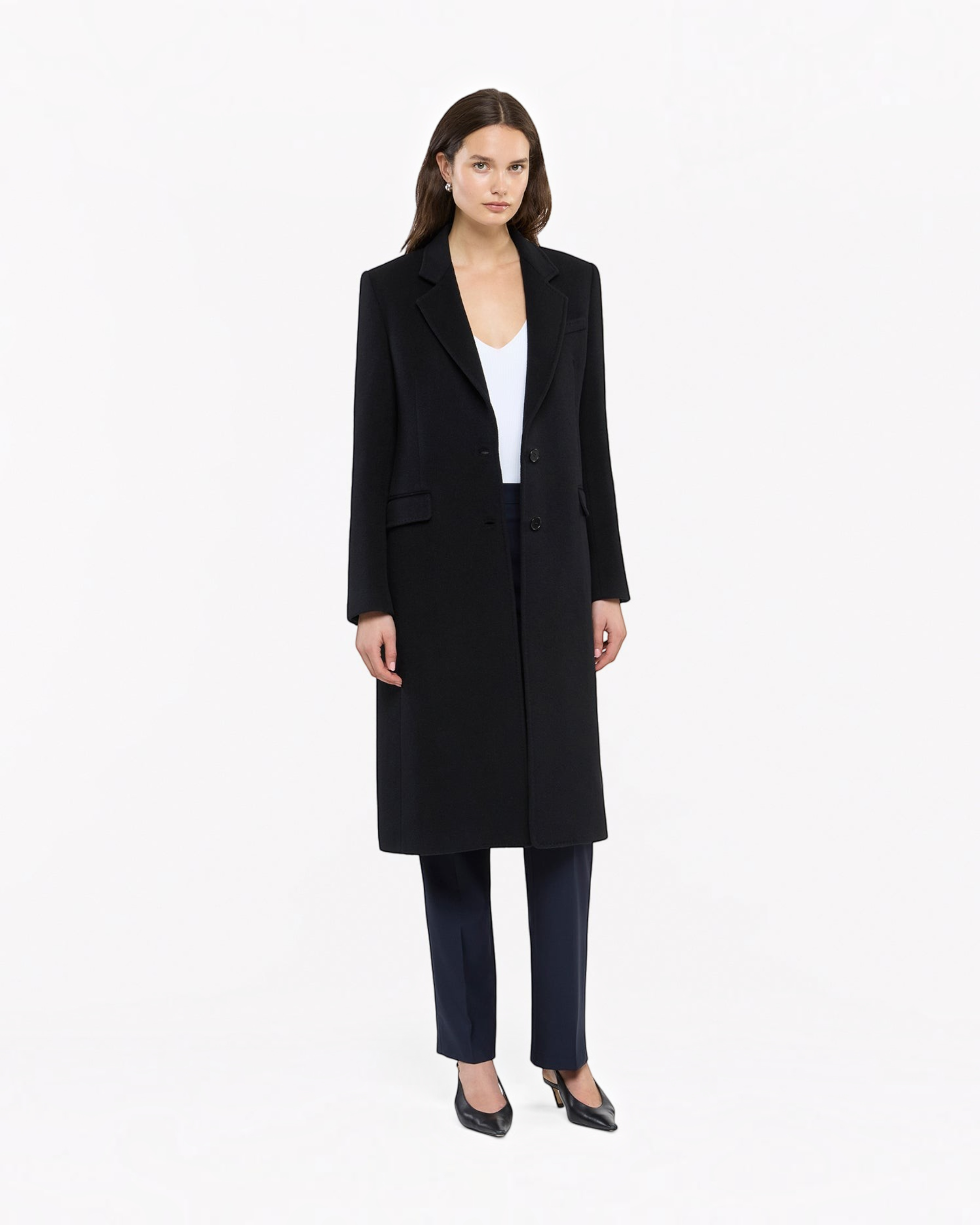 Weldun black cashmere tailored overcoat worn by a model with a white top and dark trousers