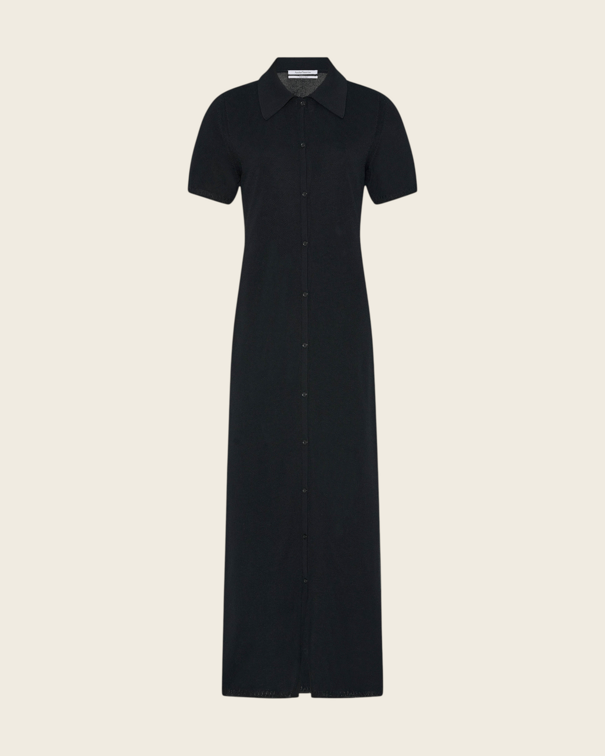 Weldun black midi pique polo dress with a button-front closure, point collar, and short sleeves in a soft blend.