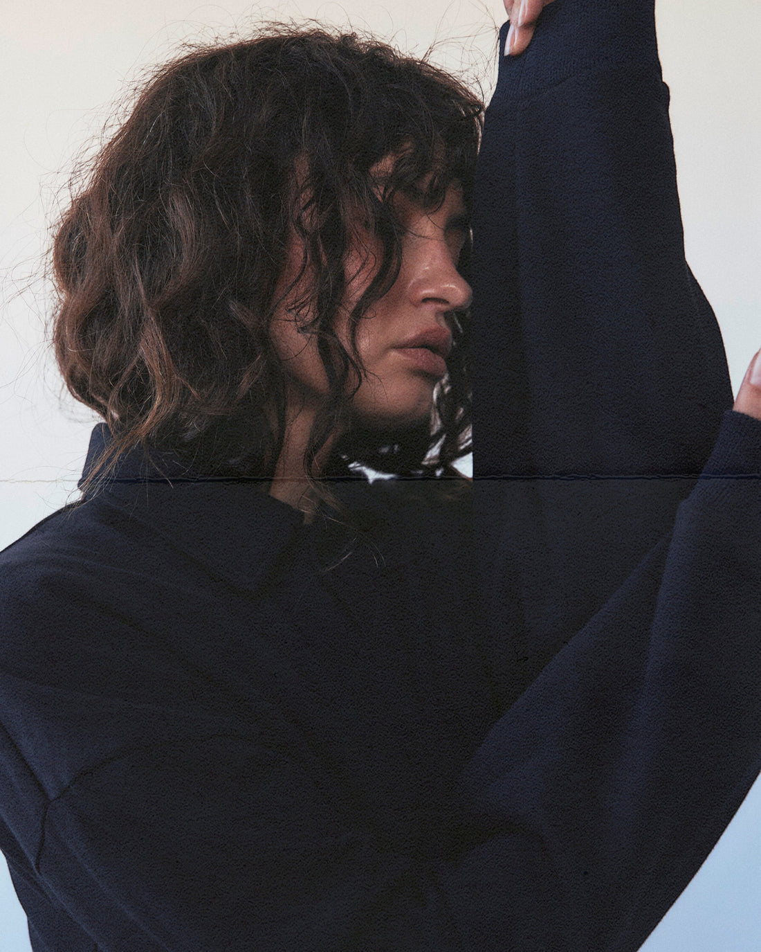 Weldun navy cotton polo sweatshirt with a high-neck ribbed collar and oversized fit worn by a woman