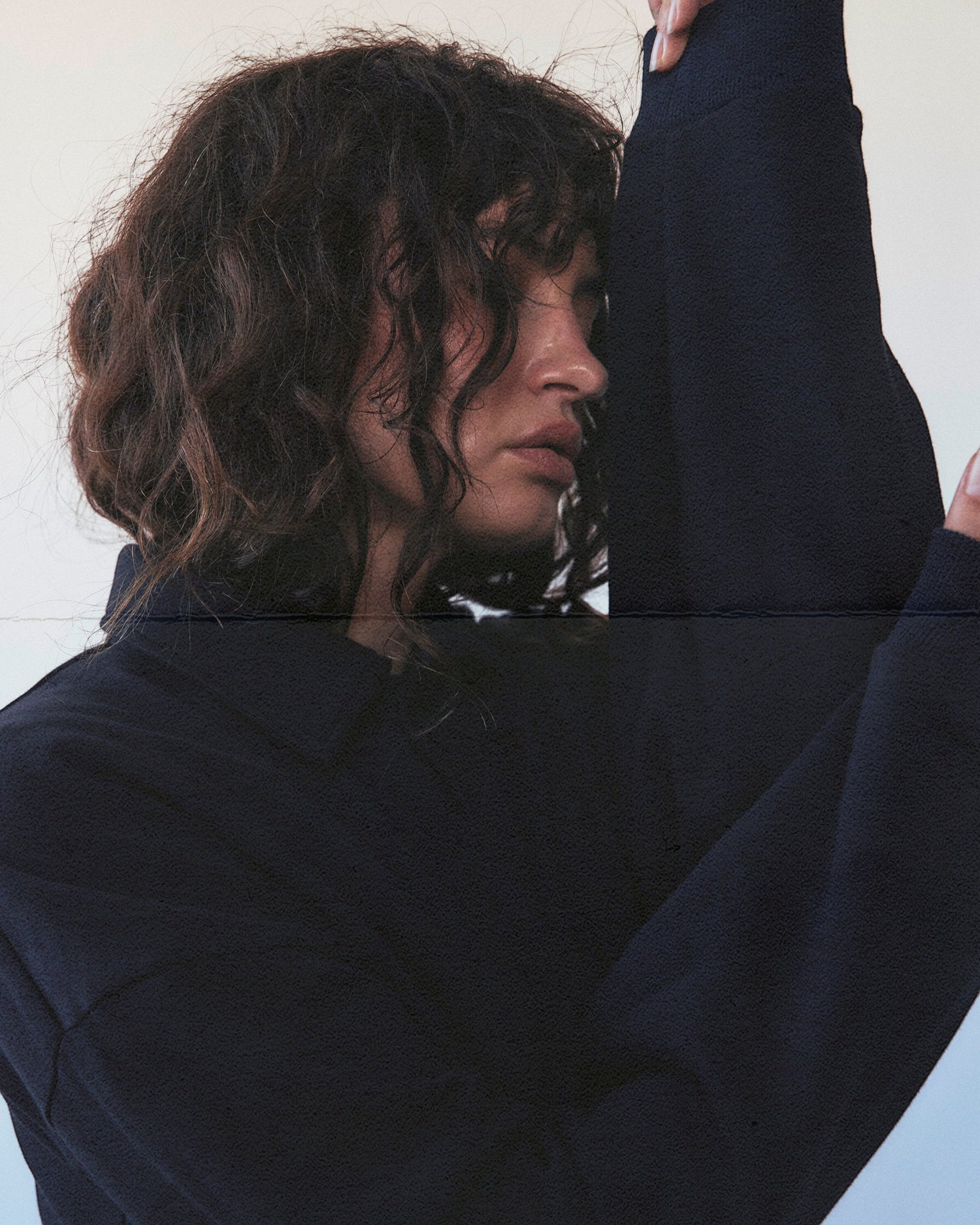 Weldun navy cotton polo sweatshirt with a high-neck ribbed collar and oversized fit worn by a woman