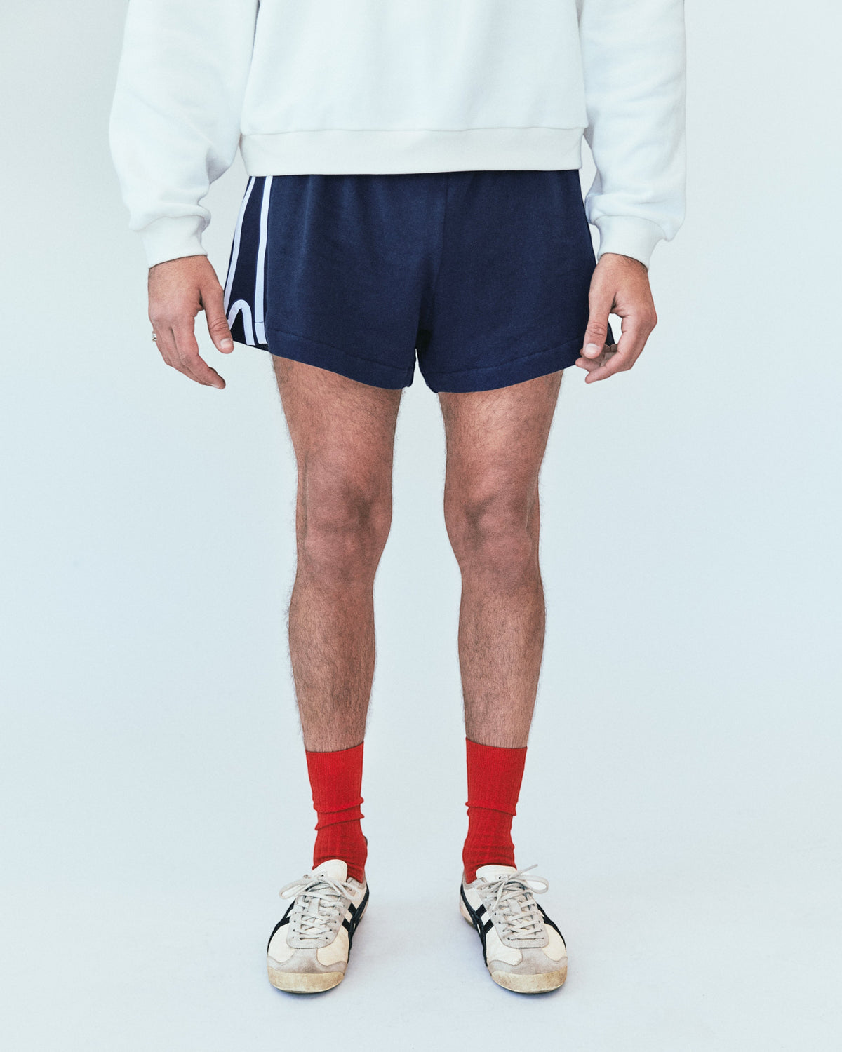 Weldun H-O-R-S-E navy blue cotton terry basketball shorts with white side stripes and an elastic waistband.