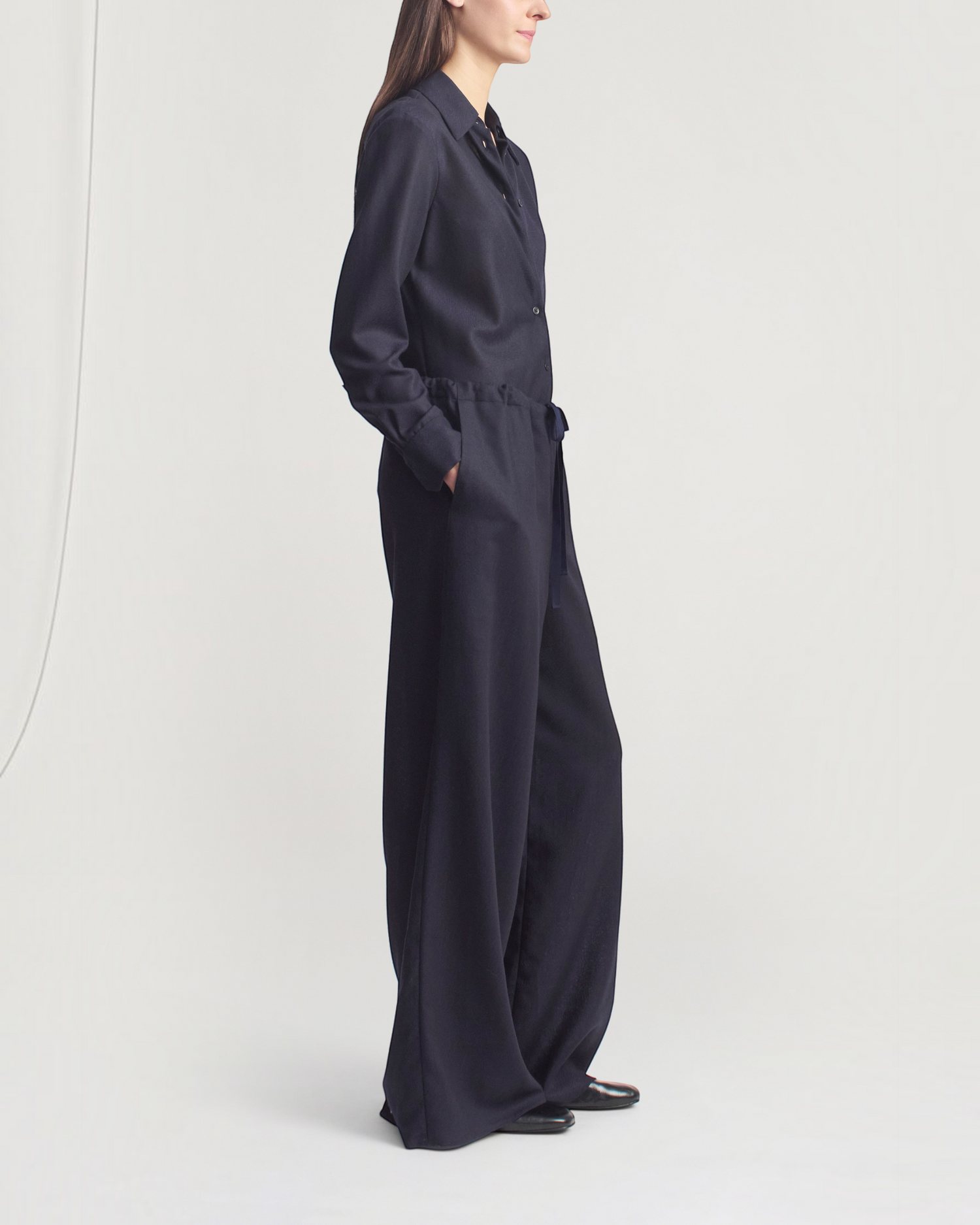Weldun KALLMEYER Cairo wide leg indigo wool pants with side pockets and adjustable drawstring waist on a model