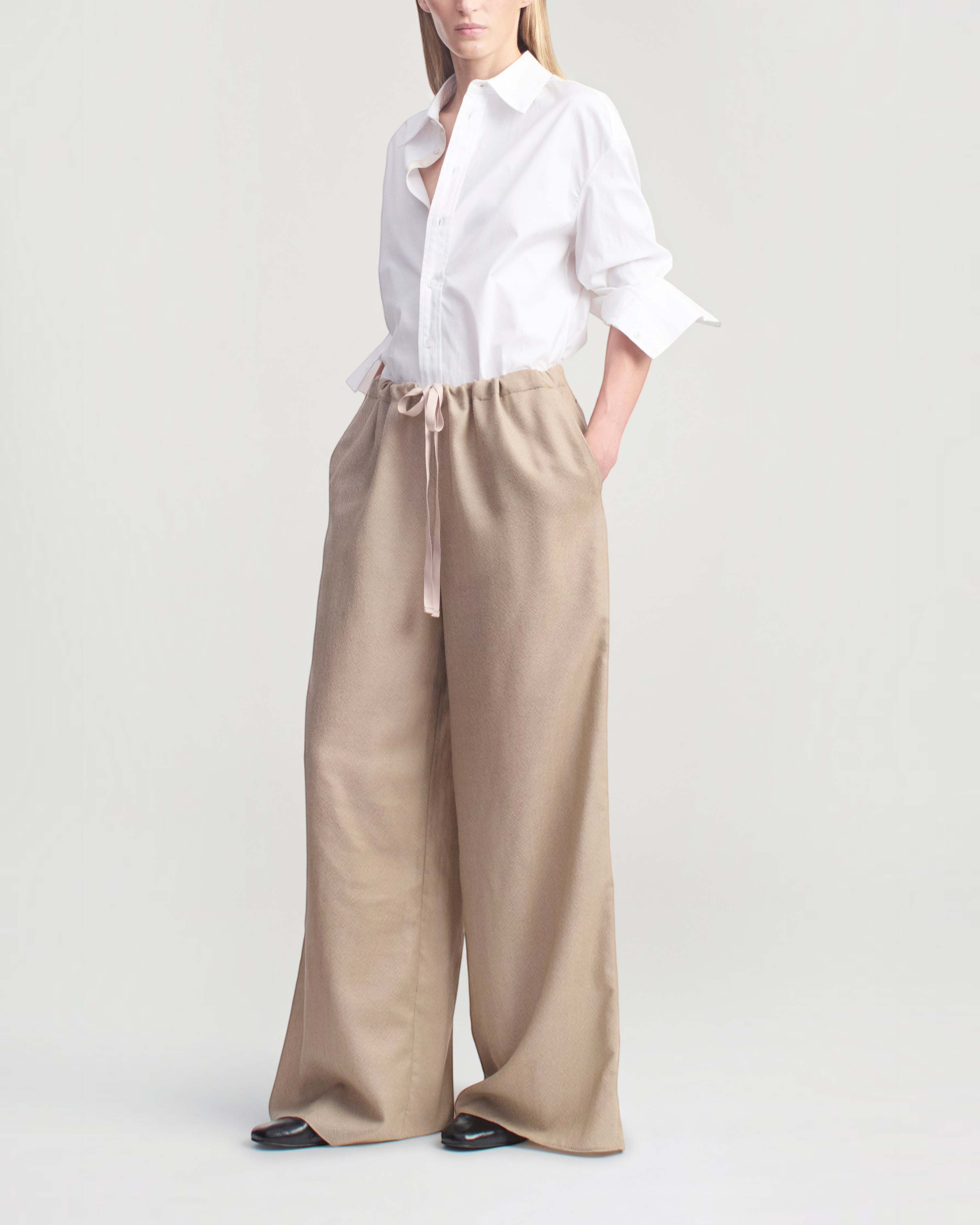 Weldun KALLMEYER Cairo wide leg pants in taupe featherweight wool with an adjustable drawstring waistband.