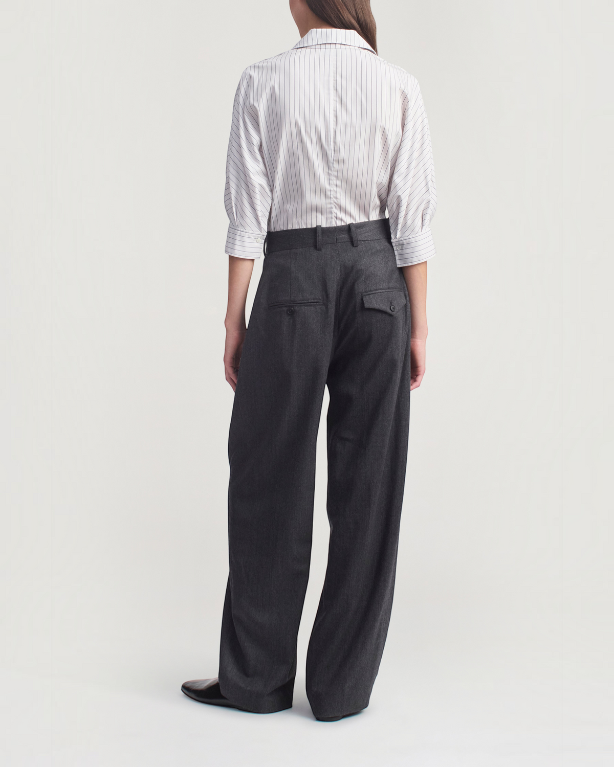 Weldun Colette 3/4 sleeve navy striped cotton poplin button down shirt worn with charcoal wide leg trousers