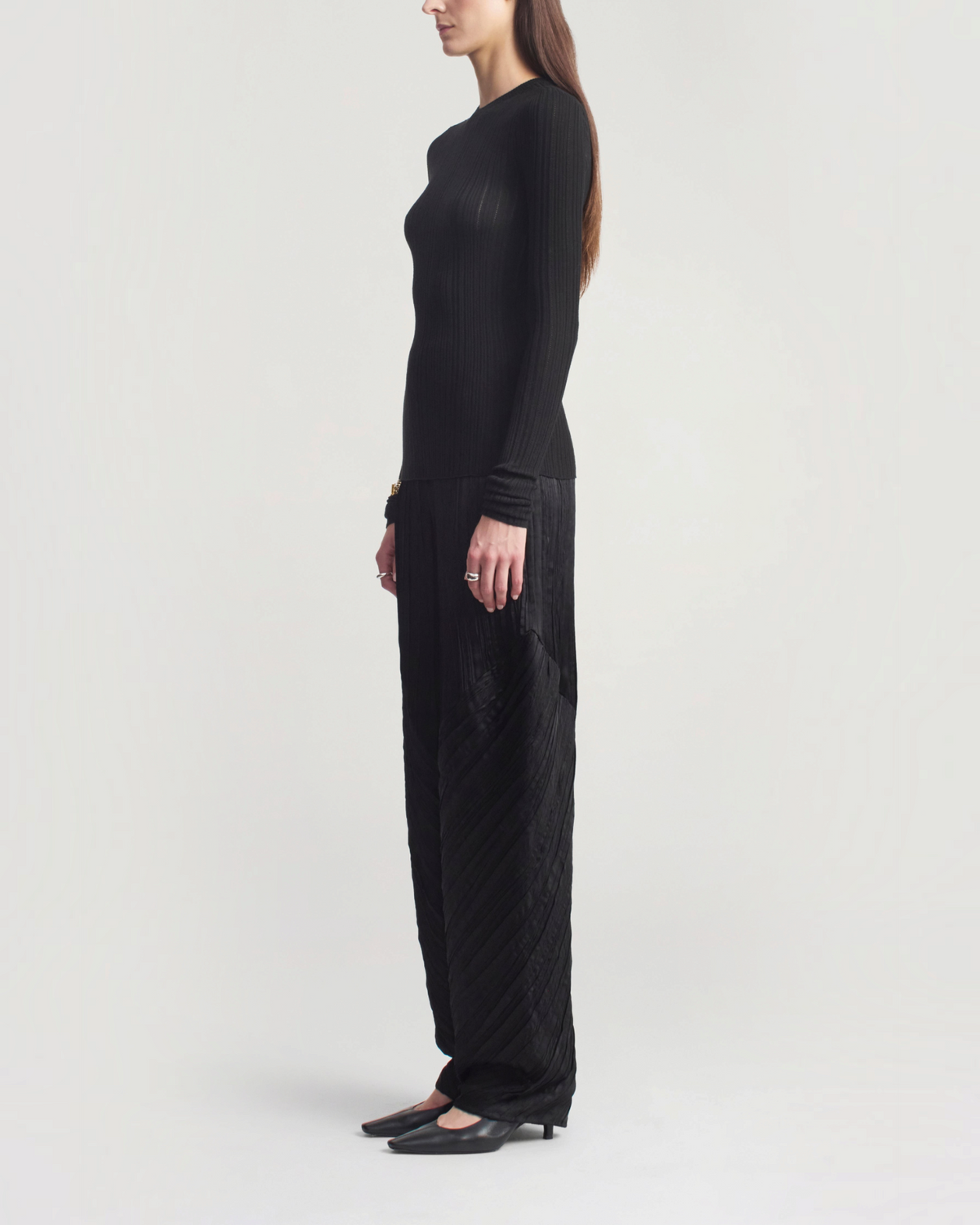 Weldun KALLMEYER black superfine pointelle long sleeve top with round neck and fitted silhouette, side view