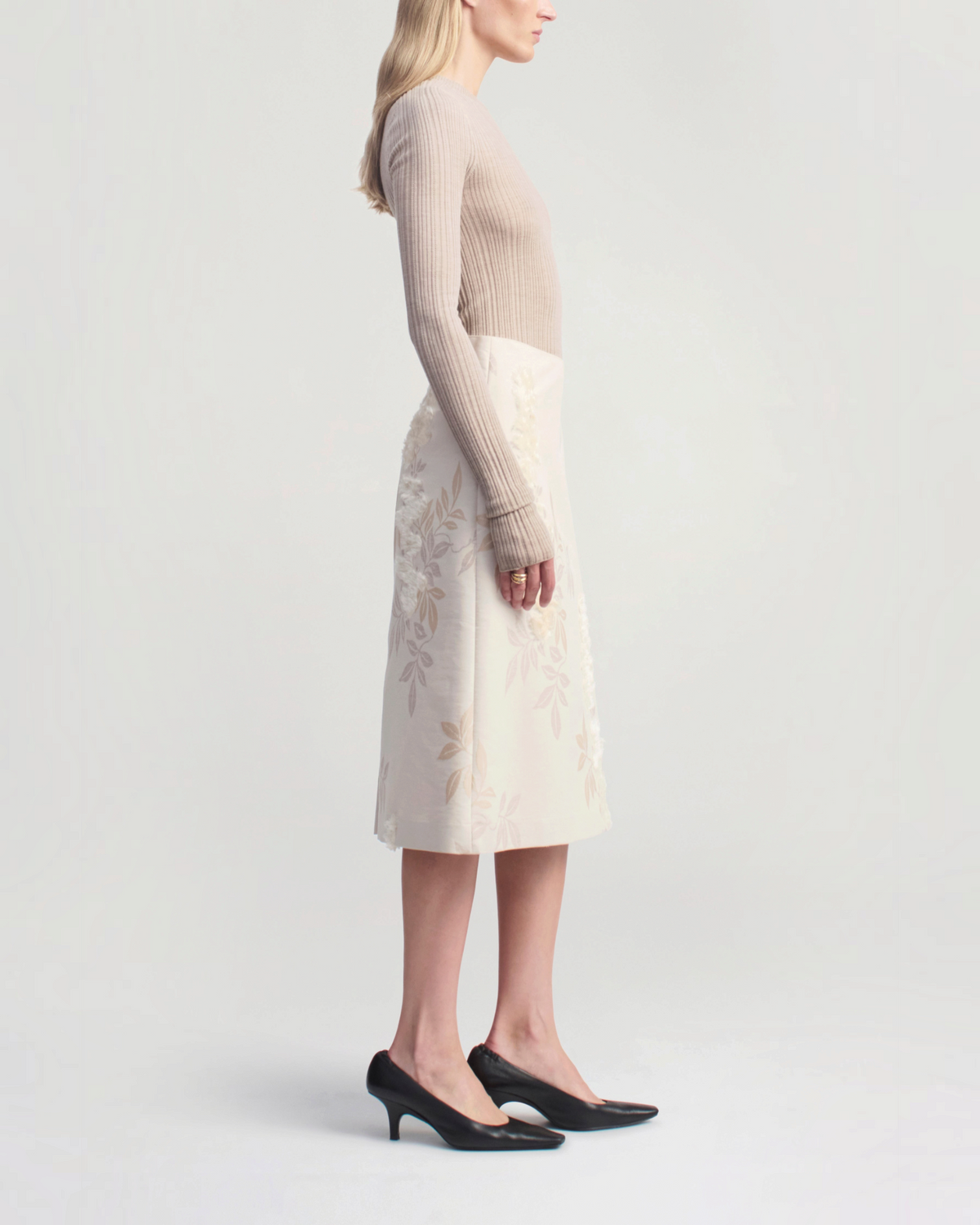 Weldun KALLMEYER Fabi fitted long sleeve top in oyster superfine pointelle knit with elongated sleeves, side view.