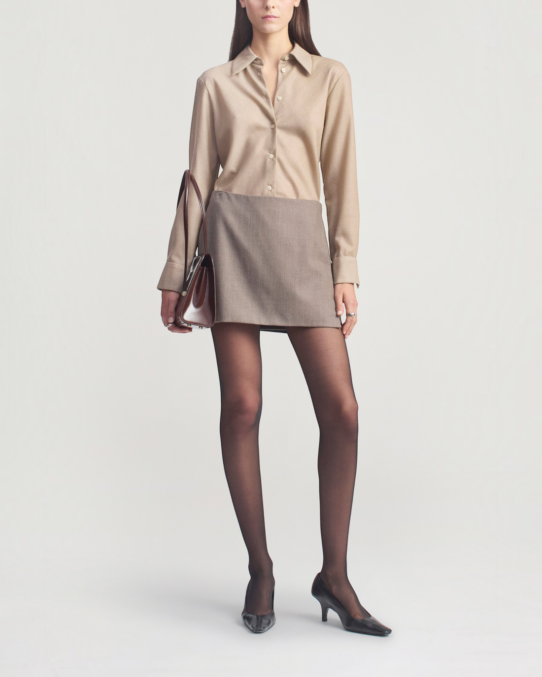 Weldun Joan bias button down shirt in taupe featherweight wool with point collar and long sleeves on a model