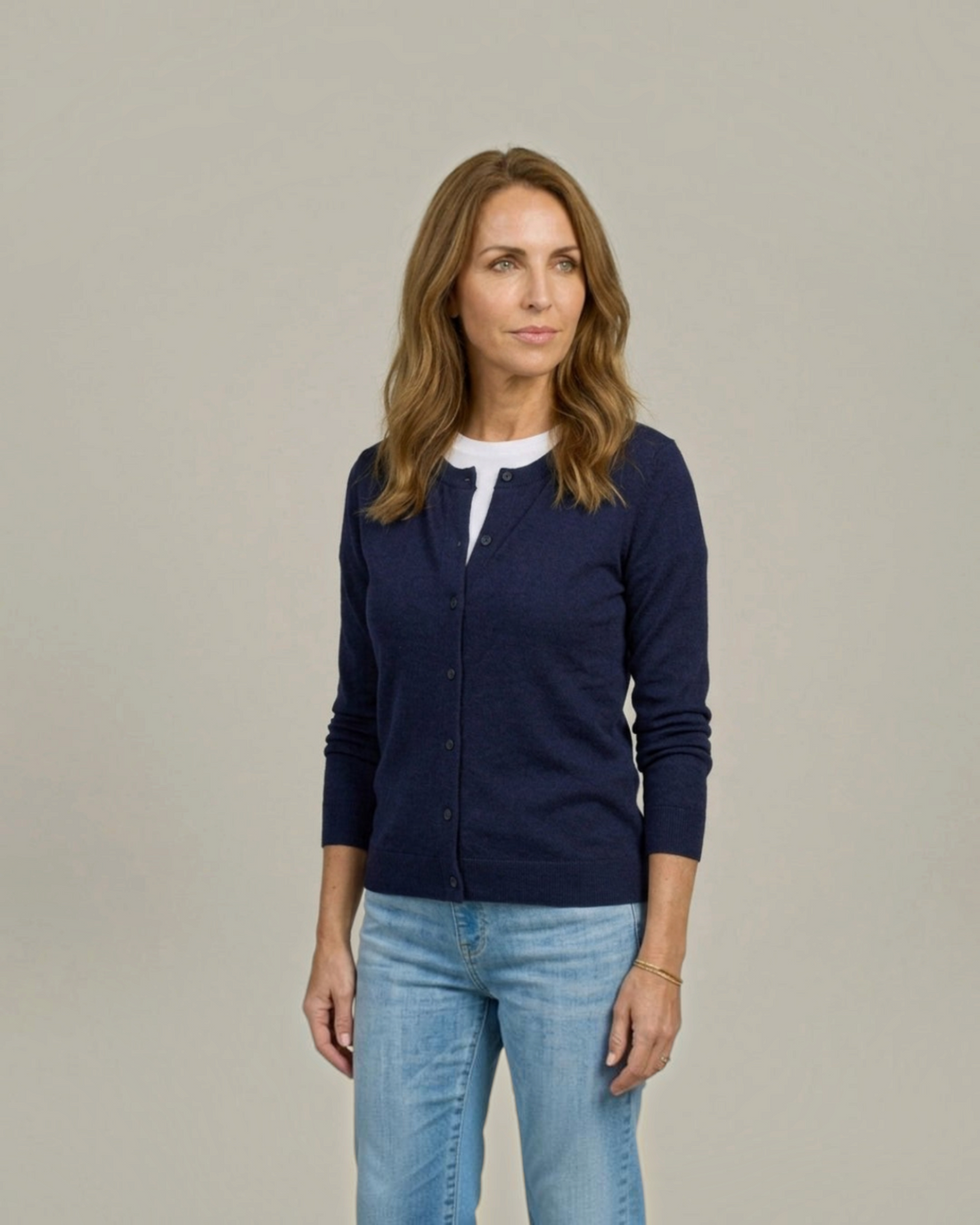 Weldun women's navy adaptive knit cardigan with magnetic front closures worn by a model with light blue jeans.