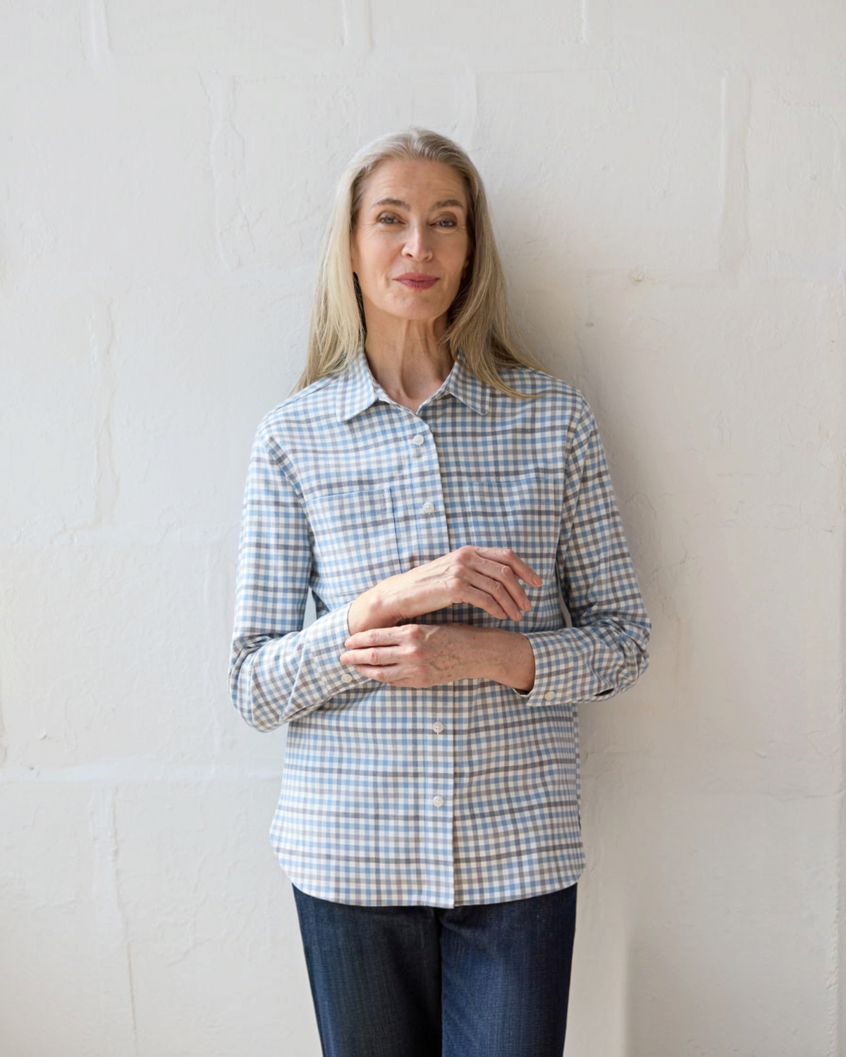 Weldun women's adaptive blue grey check flannel shirt with magnetic closures worn by a model against a white wall