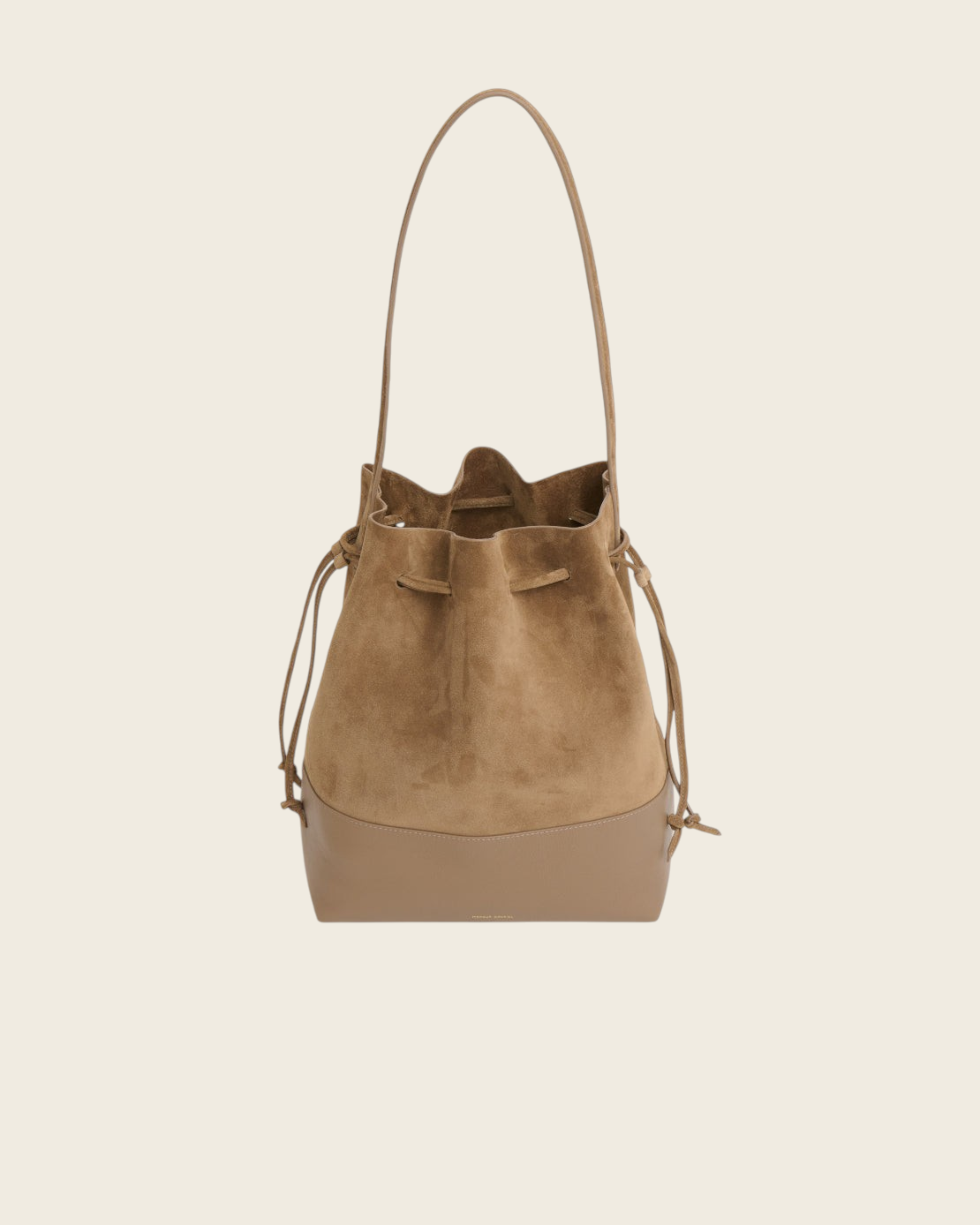 Weldun Drawstring Cabas bucket bag in anise suede and leather with long shoulder straps on a white background
