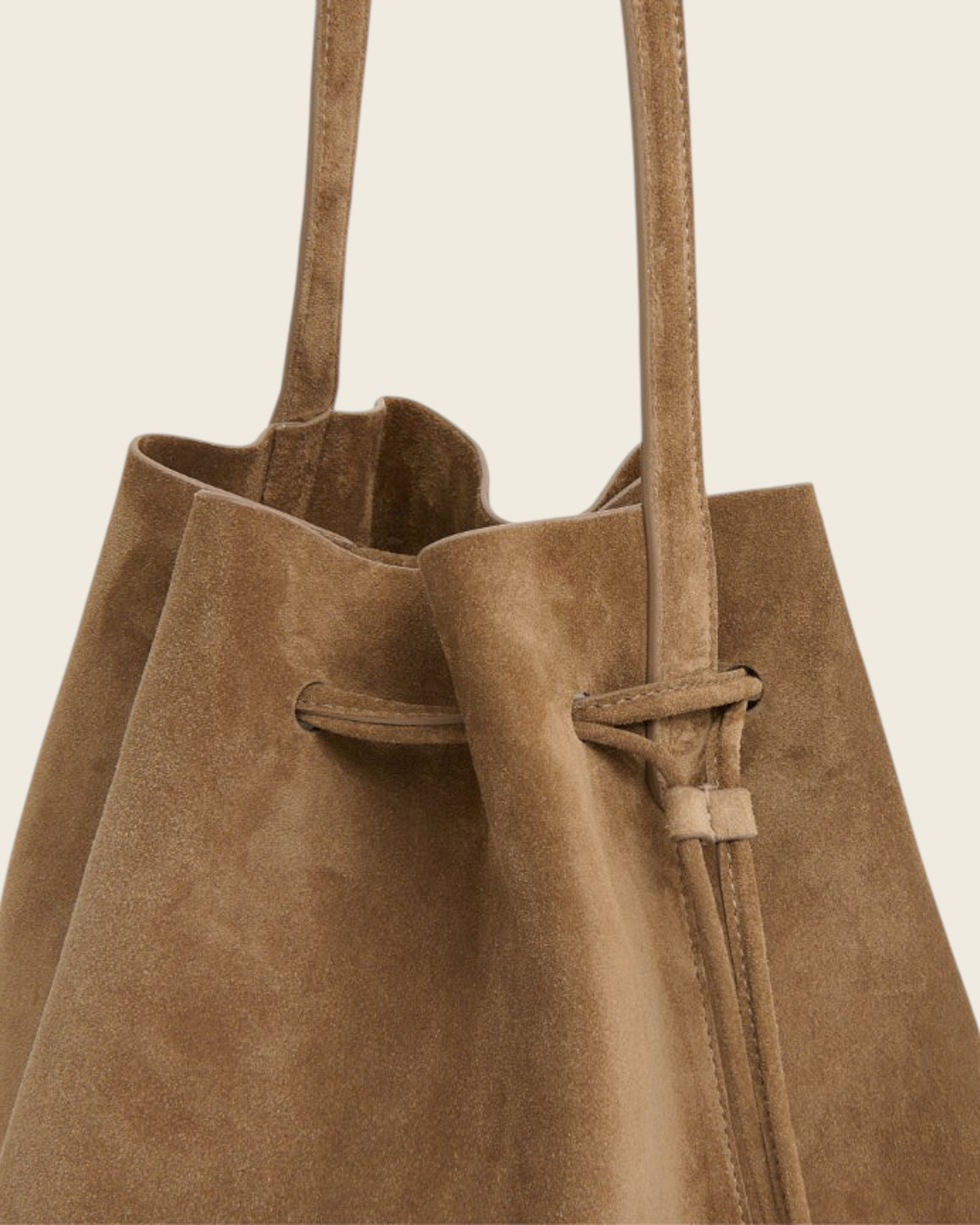 Weldun Mansur Gavriel Anise suede drawstring bucket bag with slouchy silhouette and slim top handles