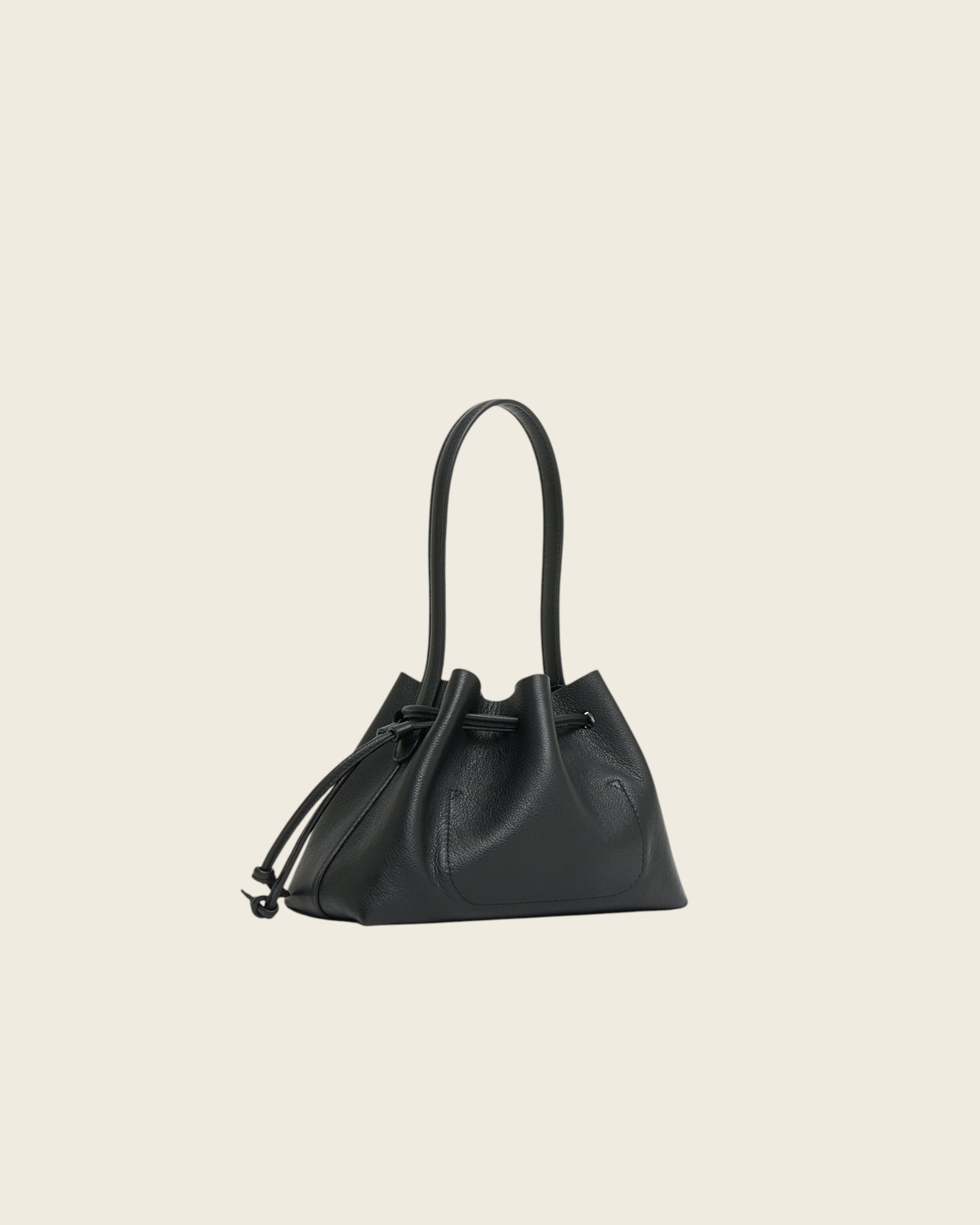 Weldun black Italian leather drawstring pouchette handbag with a structured top handle and minimalist design.