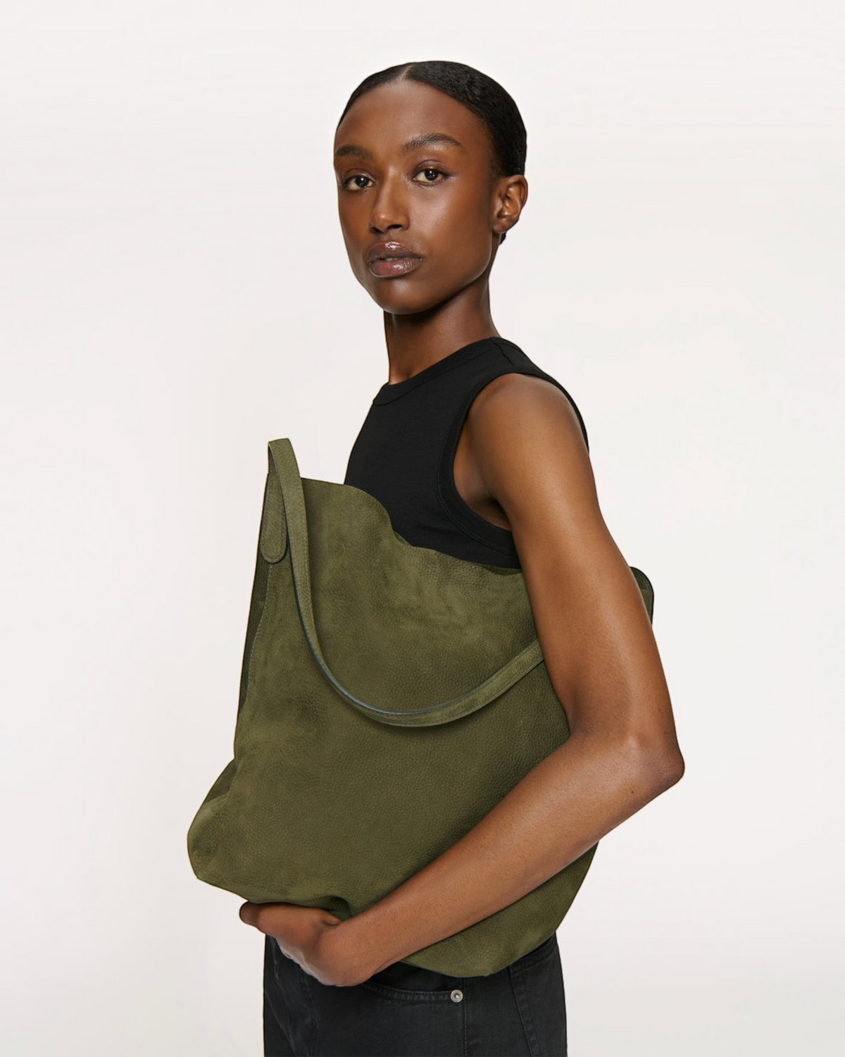 Weldun Mansur Gavriel Everyday Cabas in algae green pebbled nubuck leather with a slouchy, unstructured design.