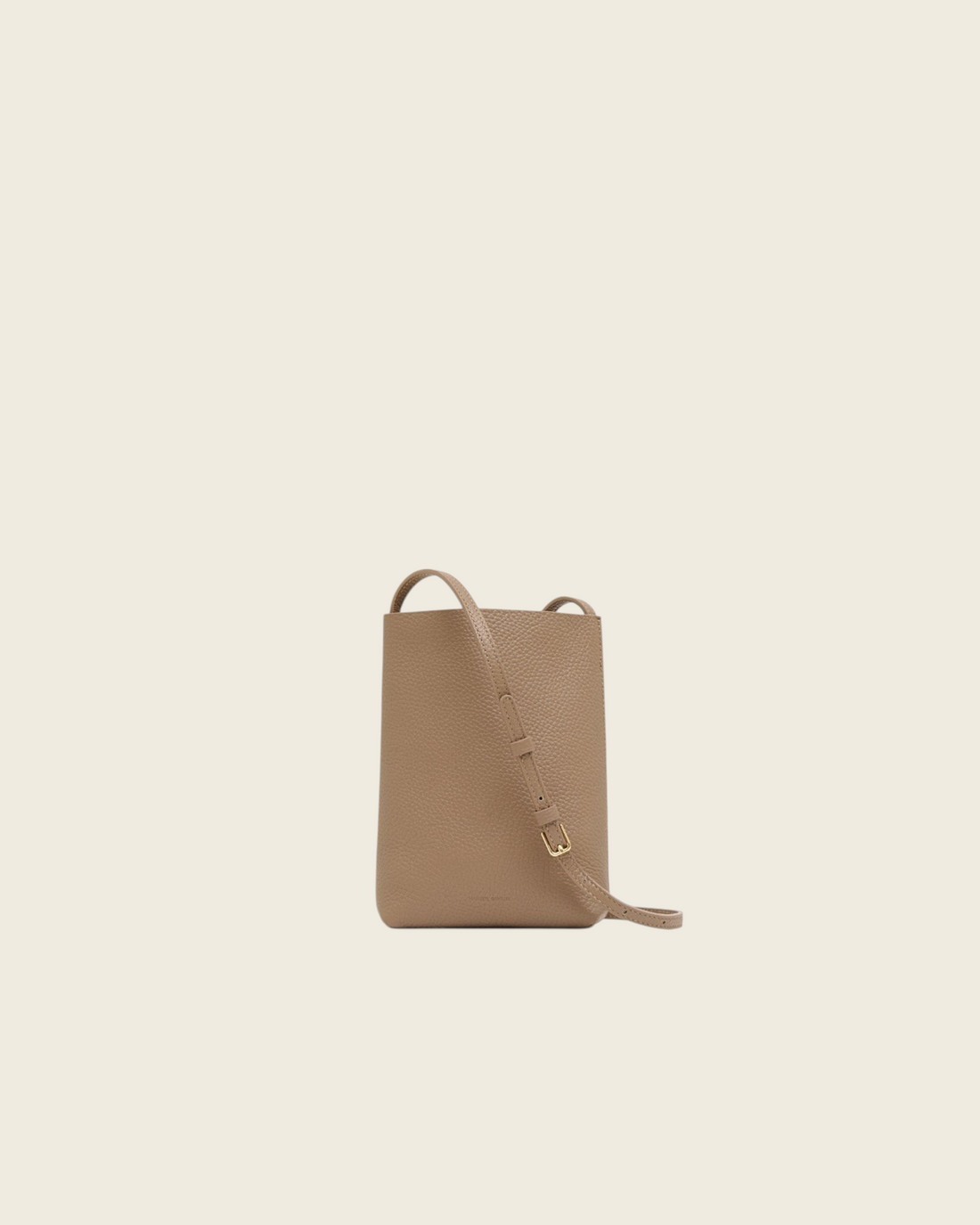 Weldun Mansur Gavriel Everyday Cabas crossbody bag in anise pebbled leather with an adjustable strap.