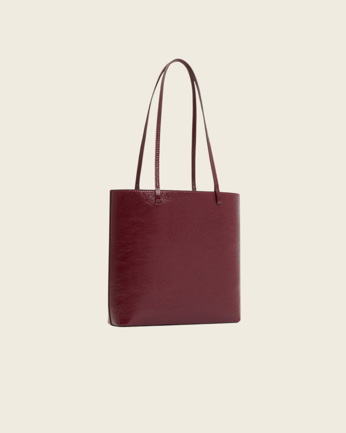 Weldun Mansur Gavriel Filo Tote in claret laminated Italian leather with a structured silhouette and shoulder straps.