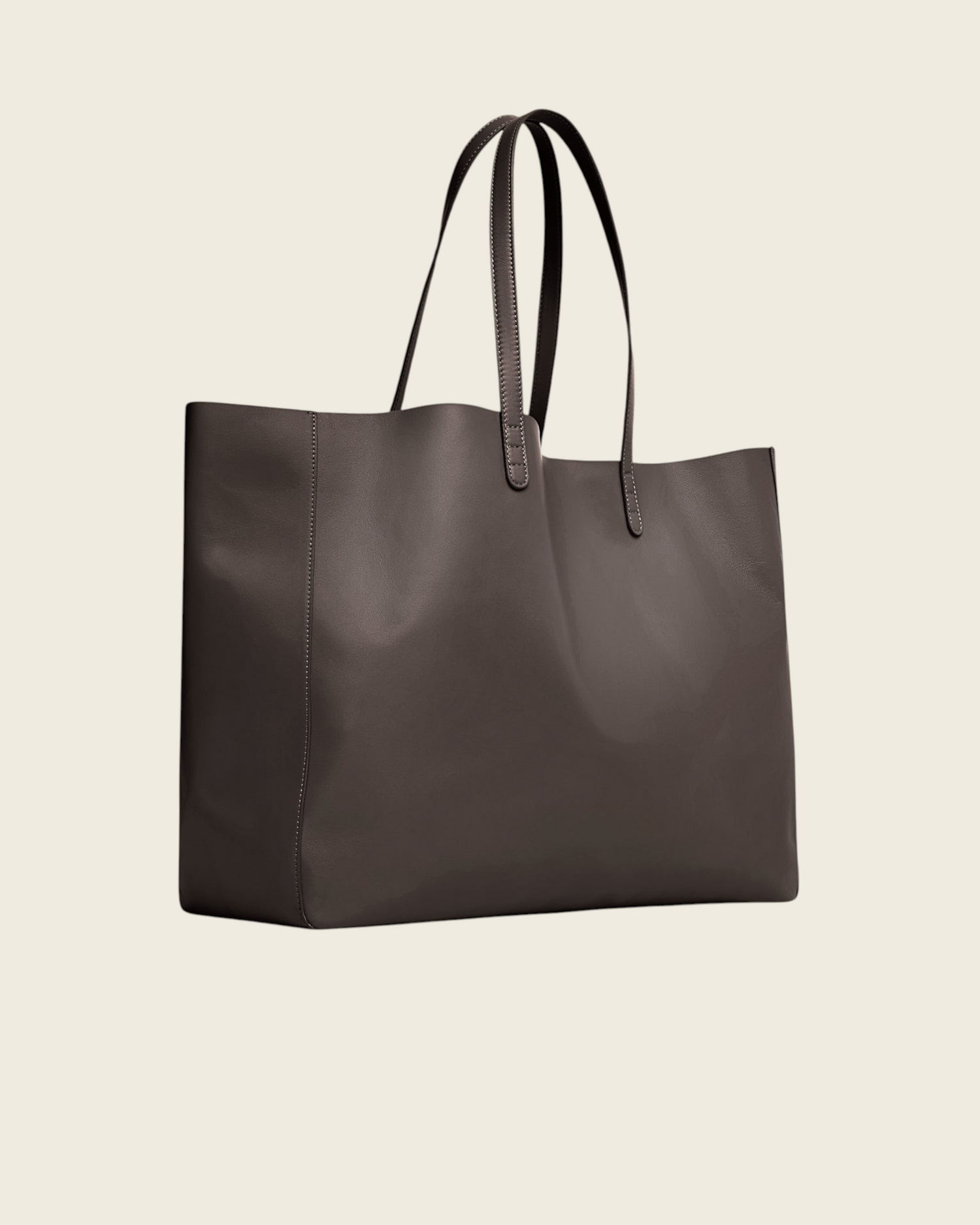 Weldun Juno oversized tote bag in ebony brown lambskin leather with a minimalist slouchy design.