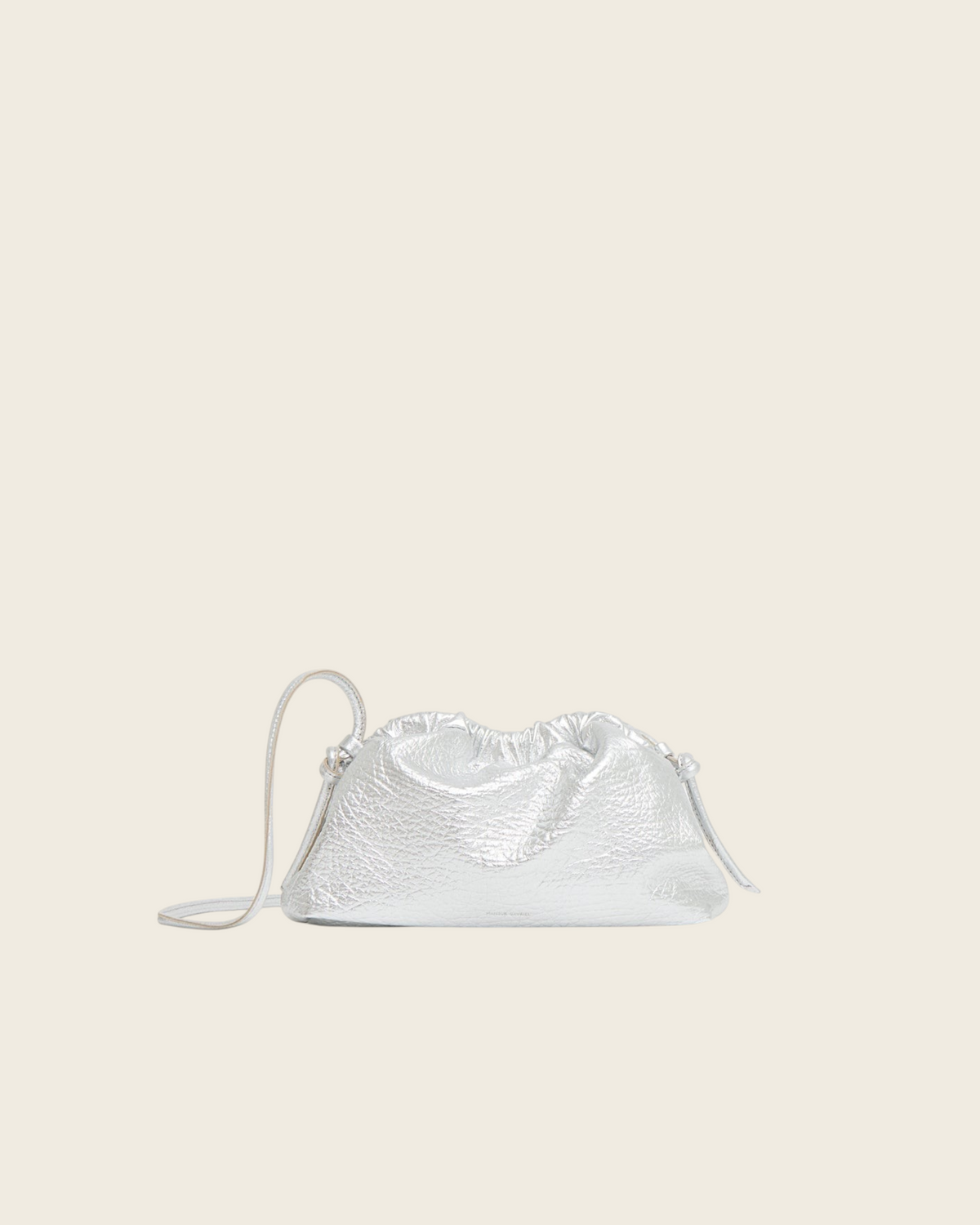 Weldun Mansur Gavriel Mini Cloud Clutch in tumbled silver metallic lambskin leather with a curved frame.
