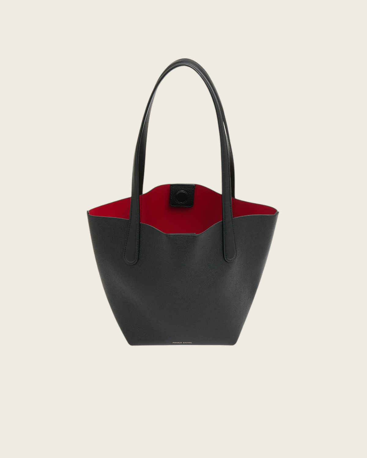 Weldun Mansur Gavriel small everyday soft tote in black calf leather with a vibrant red Flamma interior lining.