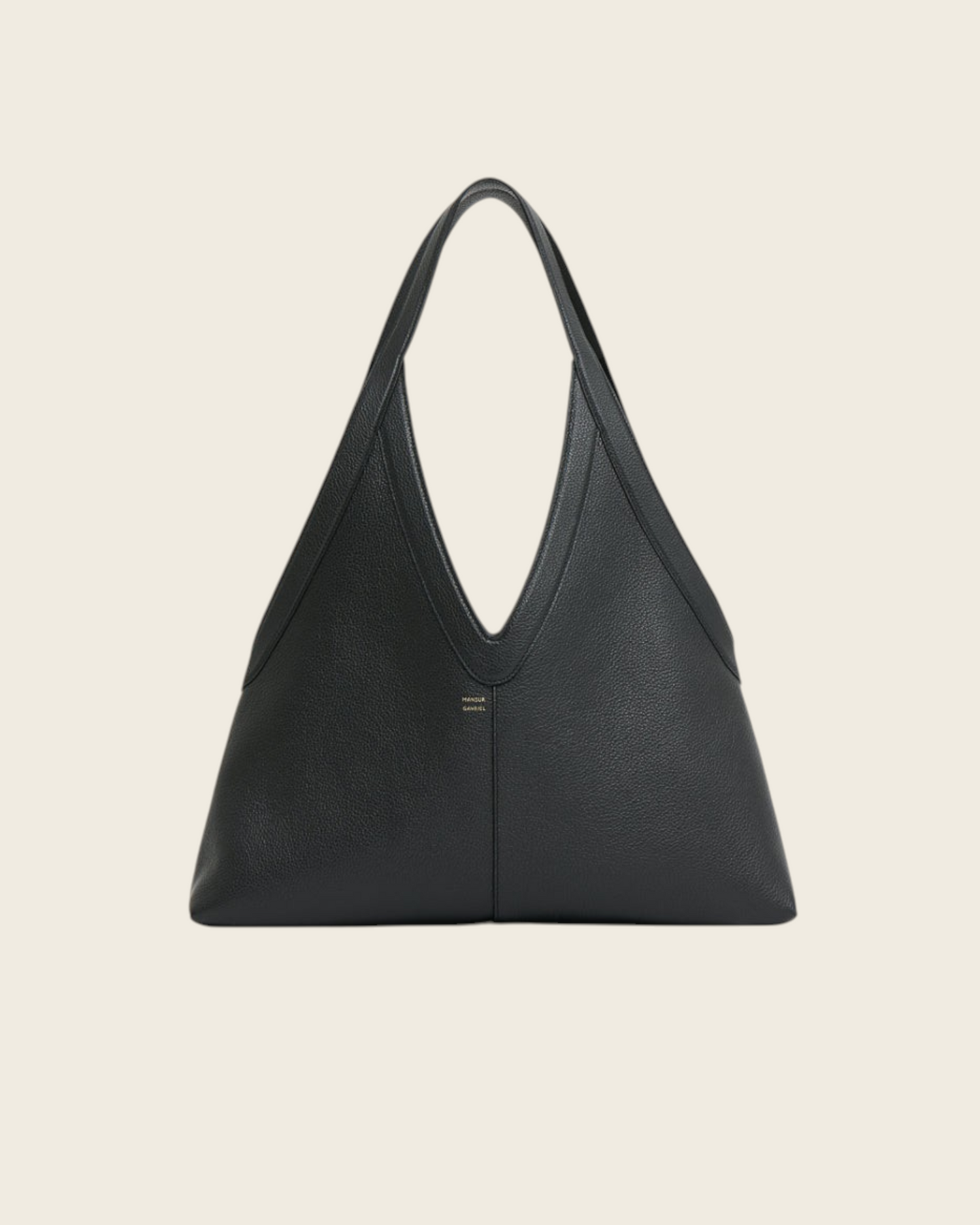 Weldun Mansur Gavriel Soft M Tote in black pebbled leather with a V-shaped shoulder strap and minimalist design.