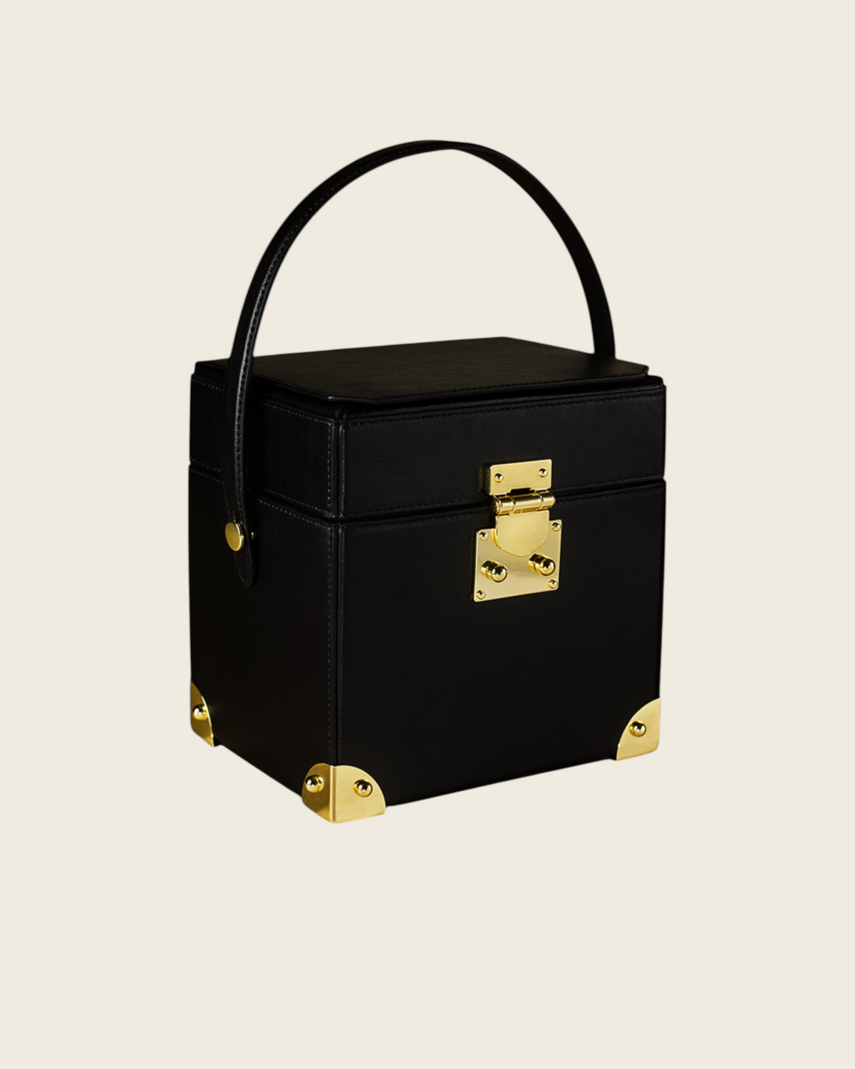 Weldun Themis breastmilk cooler handbag in black nappa leather with gold hardware and a structured top handle.