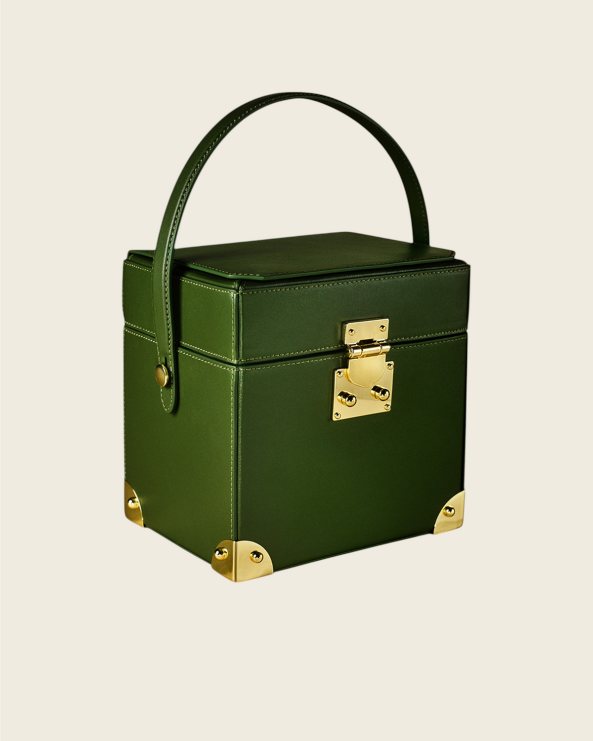 Weldun Themis breastmilk cooler in dark green nappa leather with gold hardware and a structured top handle design.