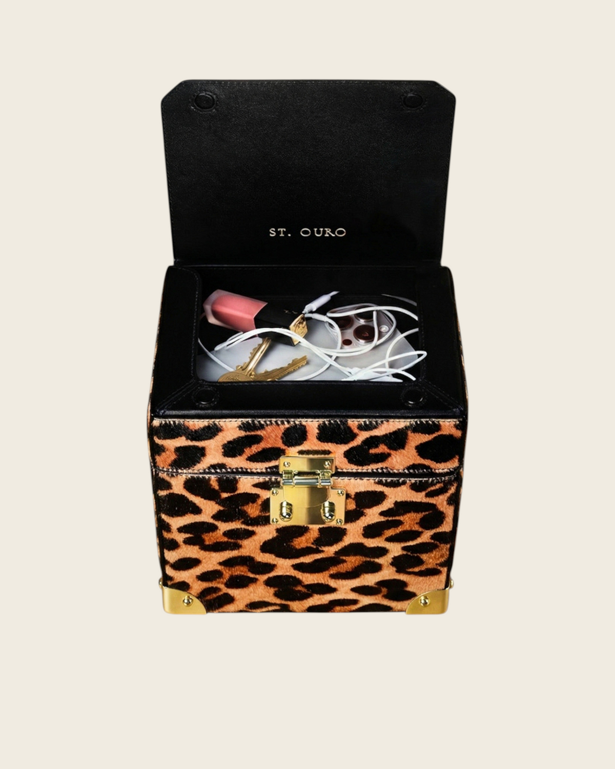 Weldun Themis breastmilk cooler in leopard print leather with gold hardware, showing the open top compartment.