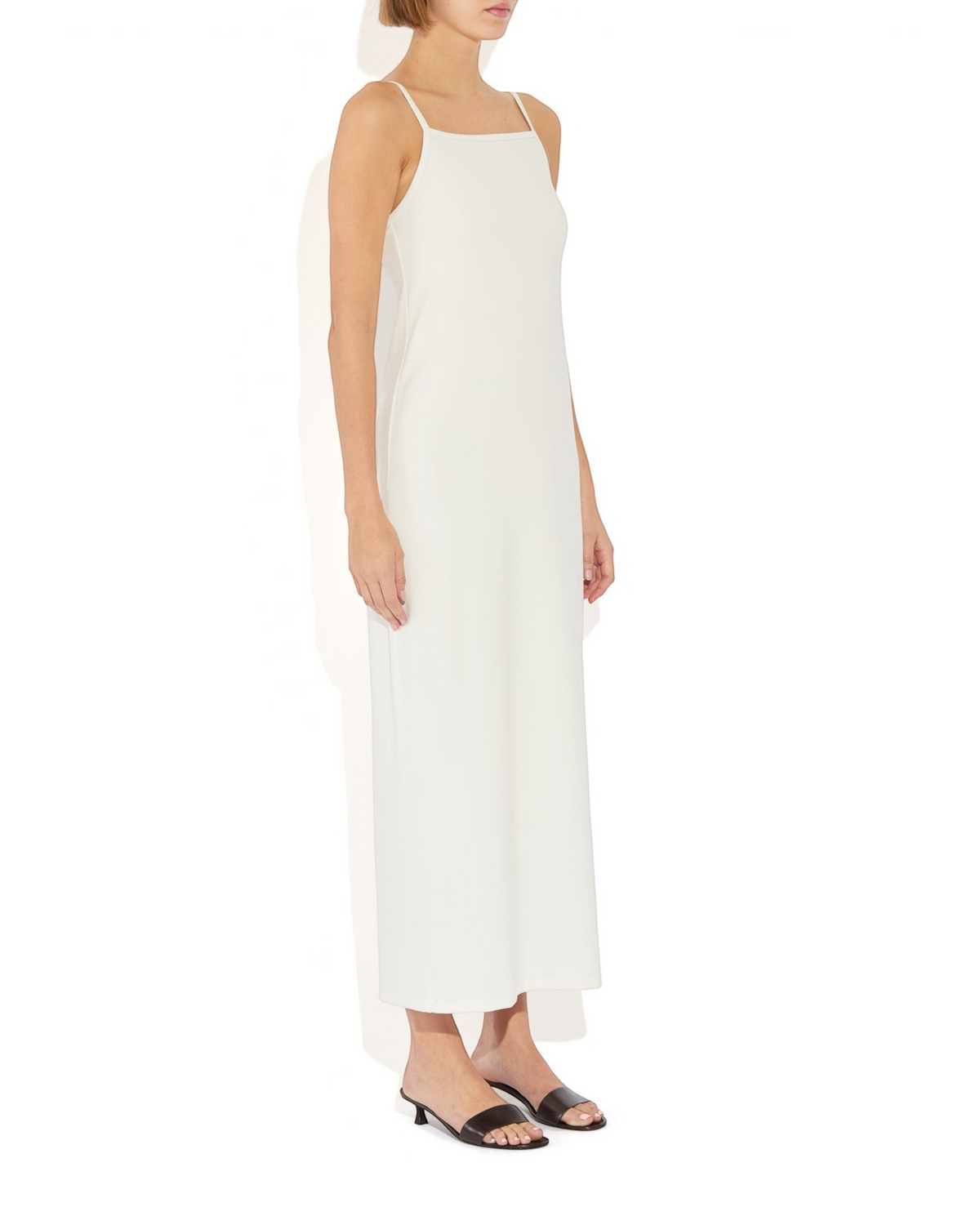 Weldun Alexandra white maxi column dress with thin straps and square neckline worn by a model