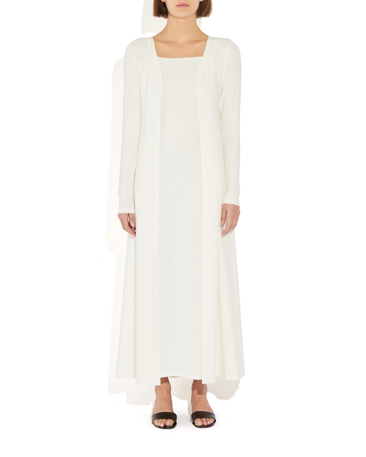 Weldun Alexandra dress in white, a long-sleeve maxi column dress with a square neckline and soft stretch fabric.