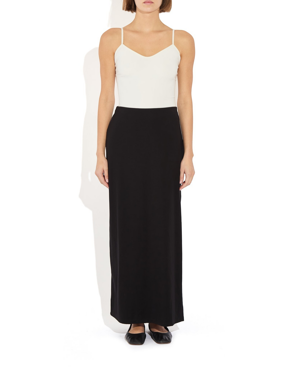 Weldun Ashley Skirt in black, a minimal column-style pull-on skirt made from soft stretch PYRATEX fabric.