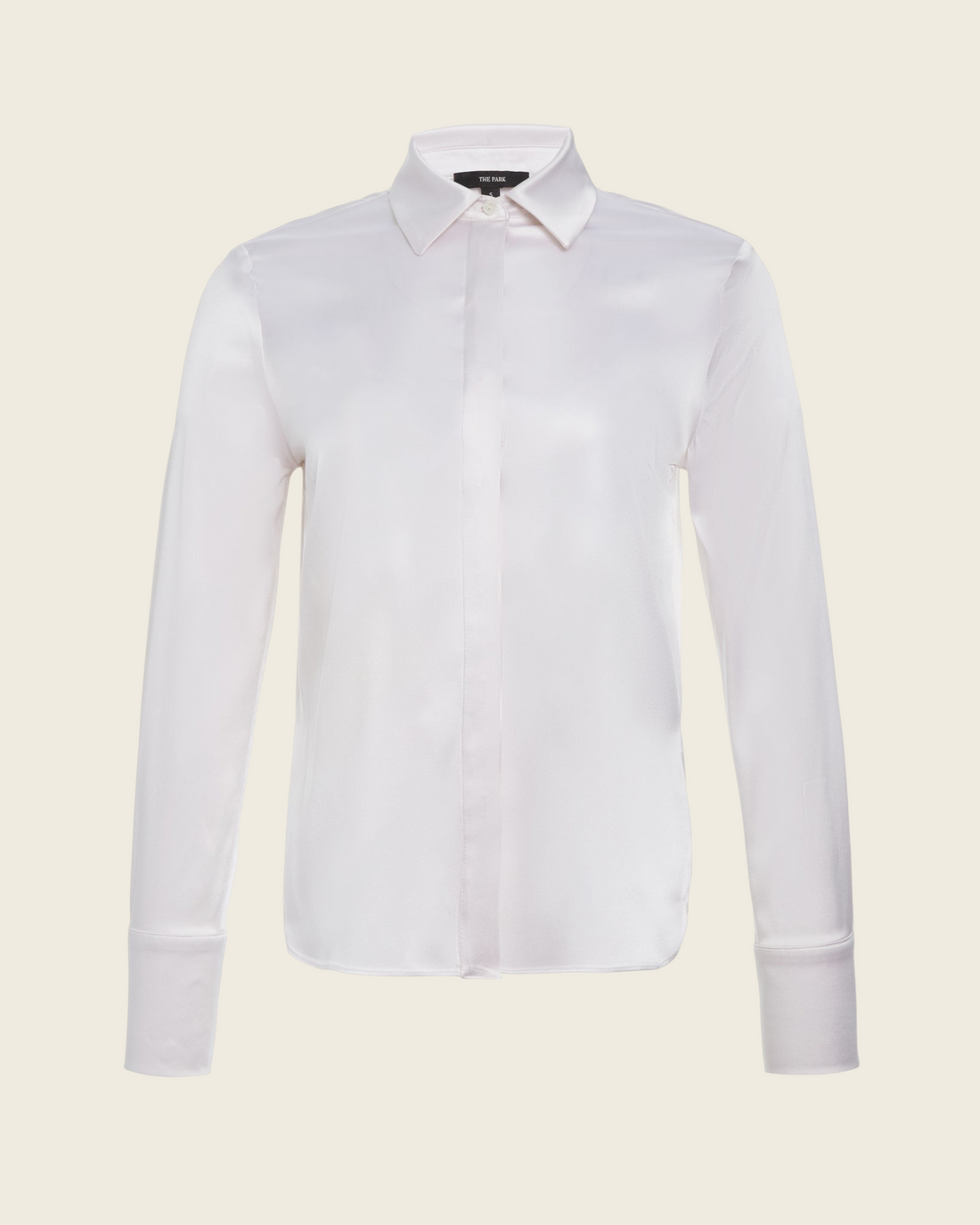 Weldun Bonnie Blouse in pale pink stretch silk with a collared neckline, long sleeves, and concealed button placket.