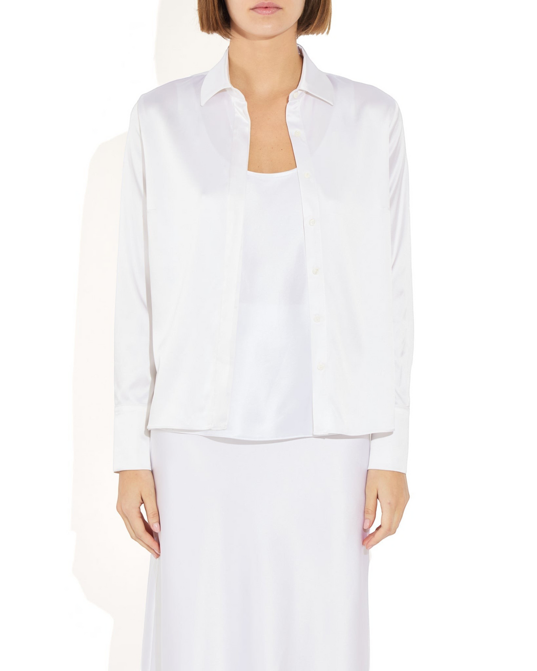 Weldun Bonnie Blouse in white stretch silk with a collared neckline and relaxed fit worn by a model