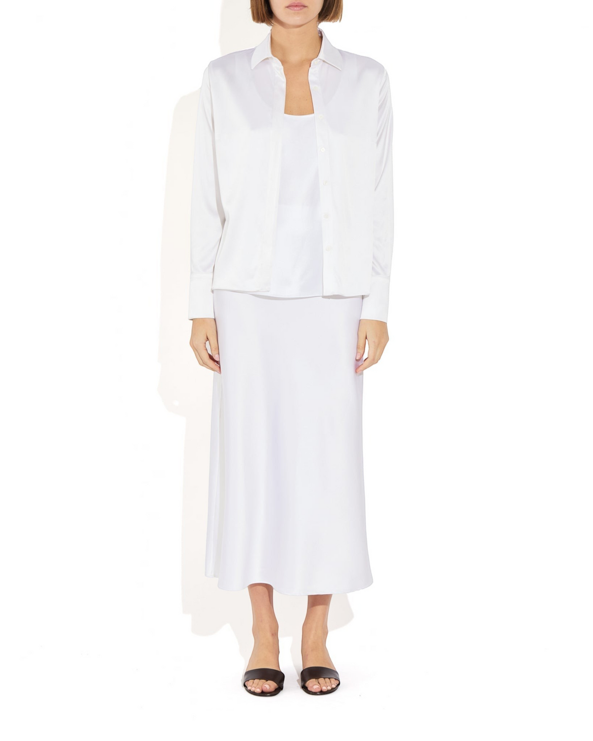 Weldun Bonnie Blouse in white stretch silk with a relaxed fit, collared neckline, and concealed button front.