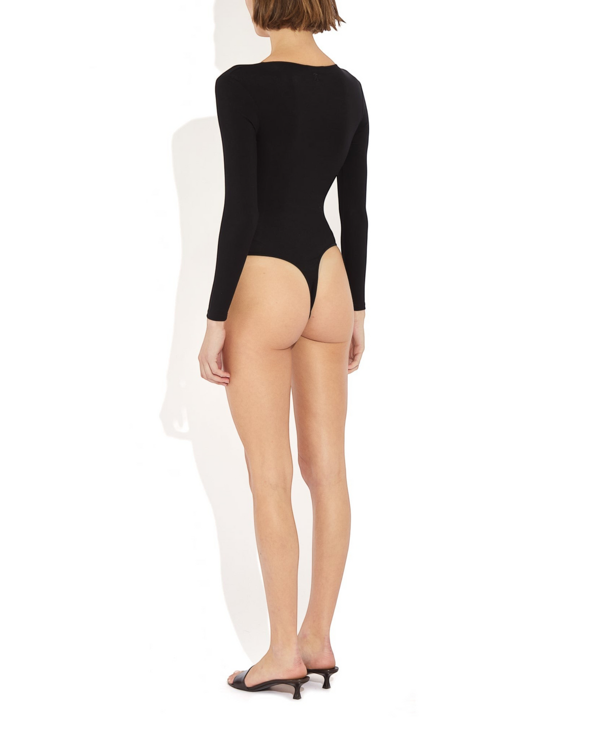 Weldun Donna long-sleeve black bodysuit in soft stretch-knit fabric with a cheeky cut, shown from the back view.