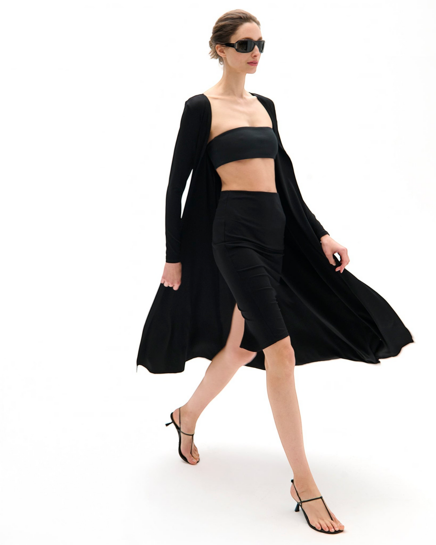Weldun Julia Cardigan in black, a long fluid open-front layer made from soft breathable PYRATEX fabric on a model.