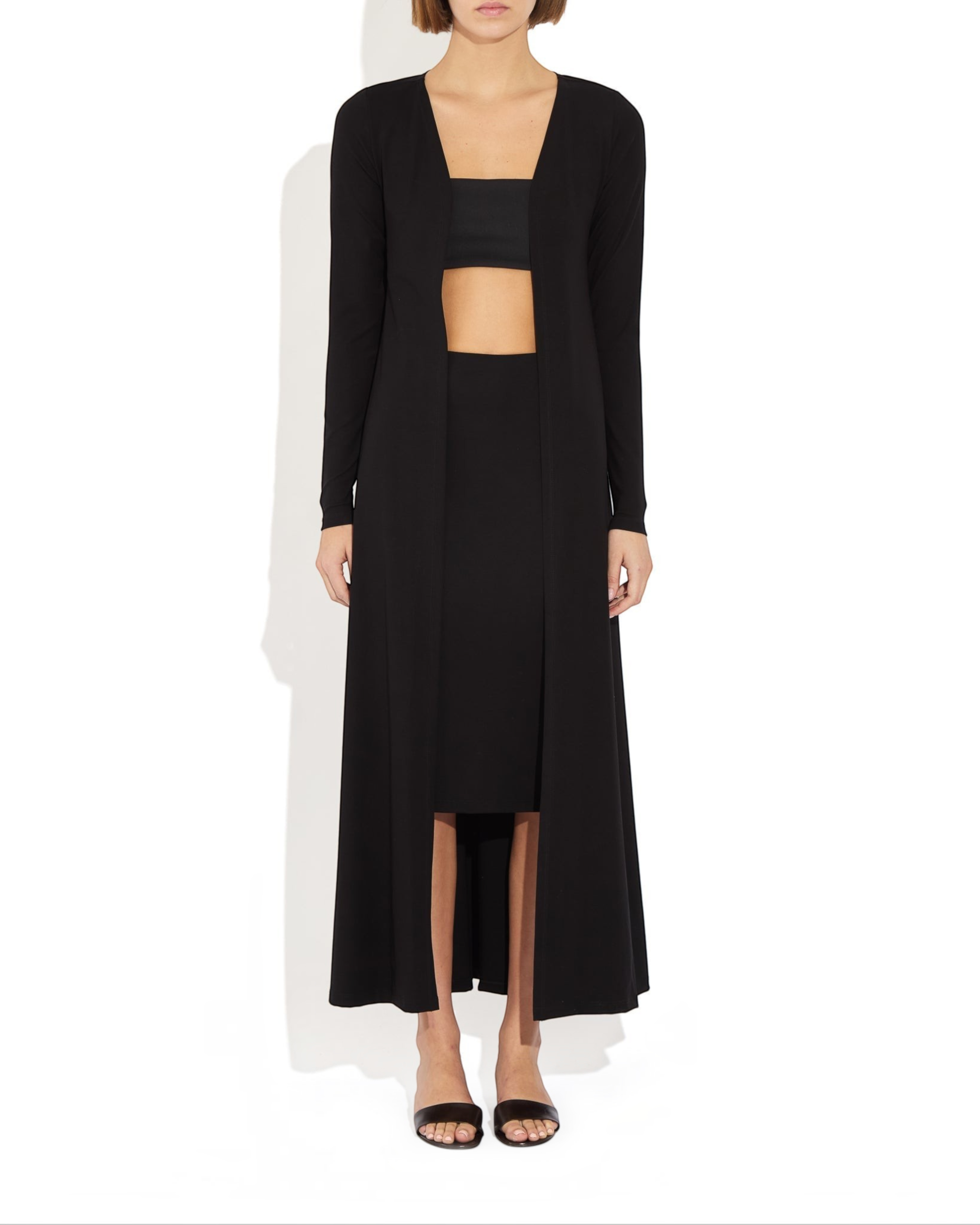 Weldun Julia long black open-front cardigan made from soft breathable PYRATEX fabric worn by a model