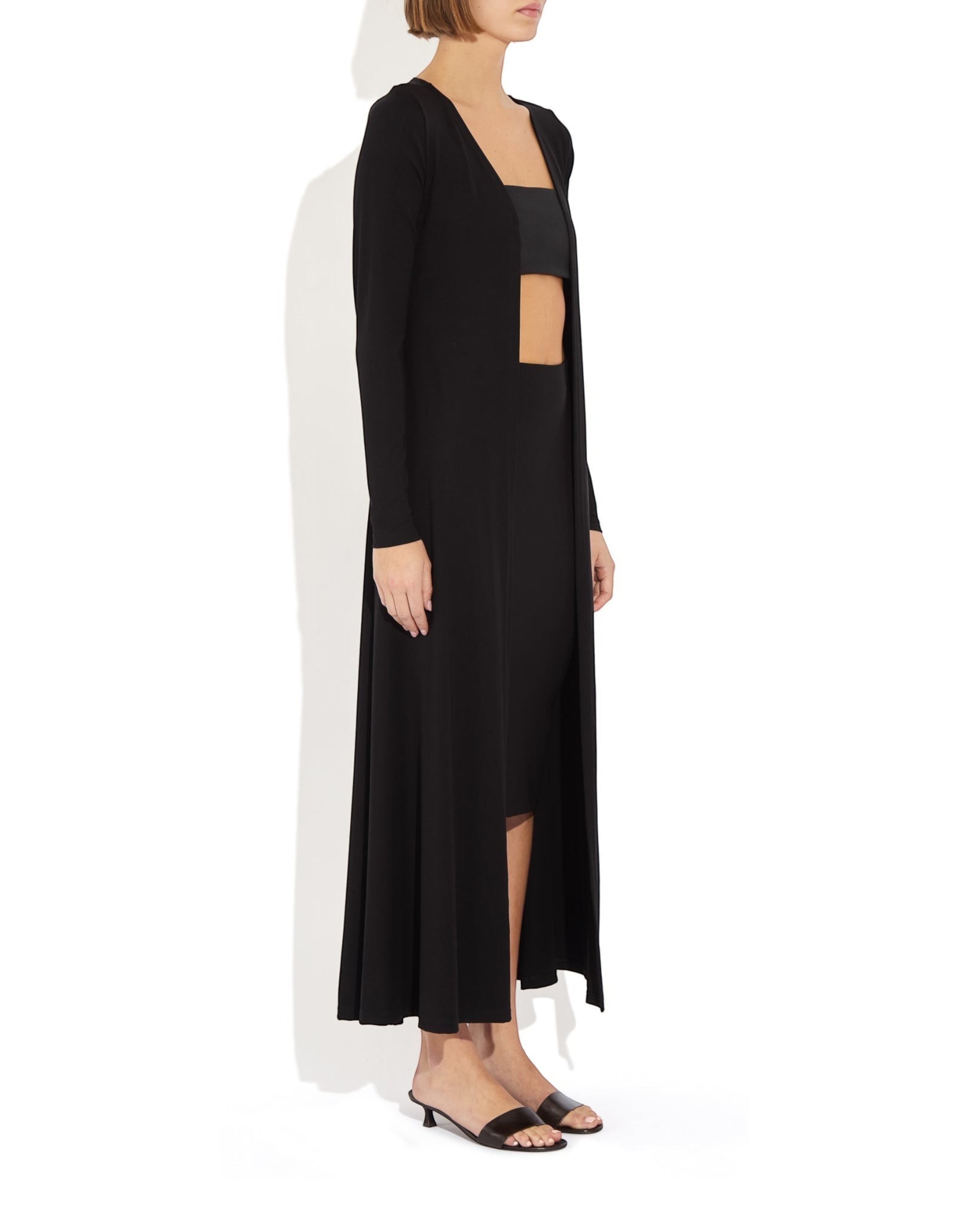 Weldun Julia Cardigan in black, a long open-front fluid layer made from soft, breathable PYRATEX Power 3 fabric.